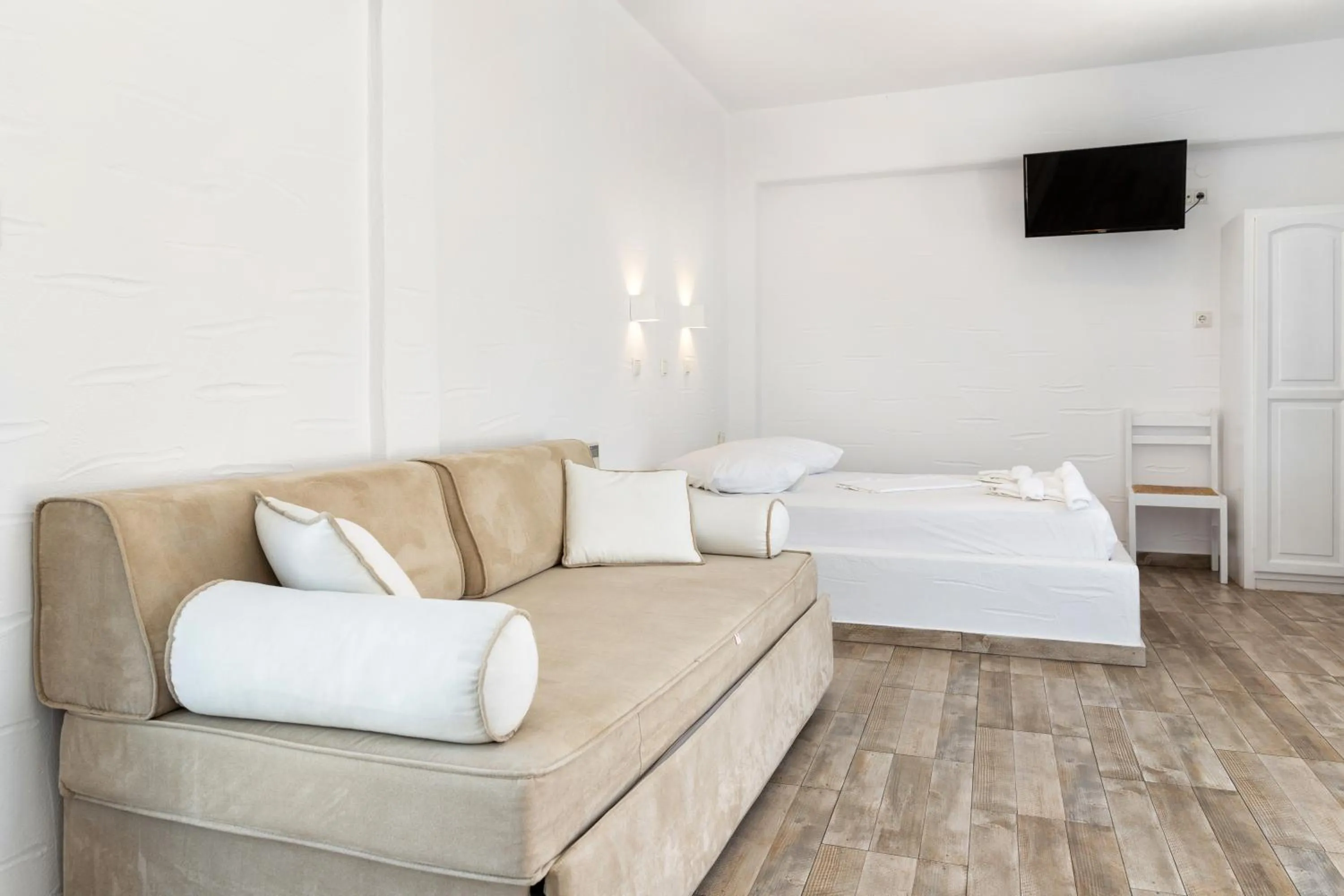 Bed in Stratos Apartments & Studios