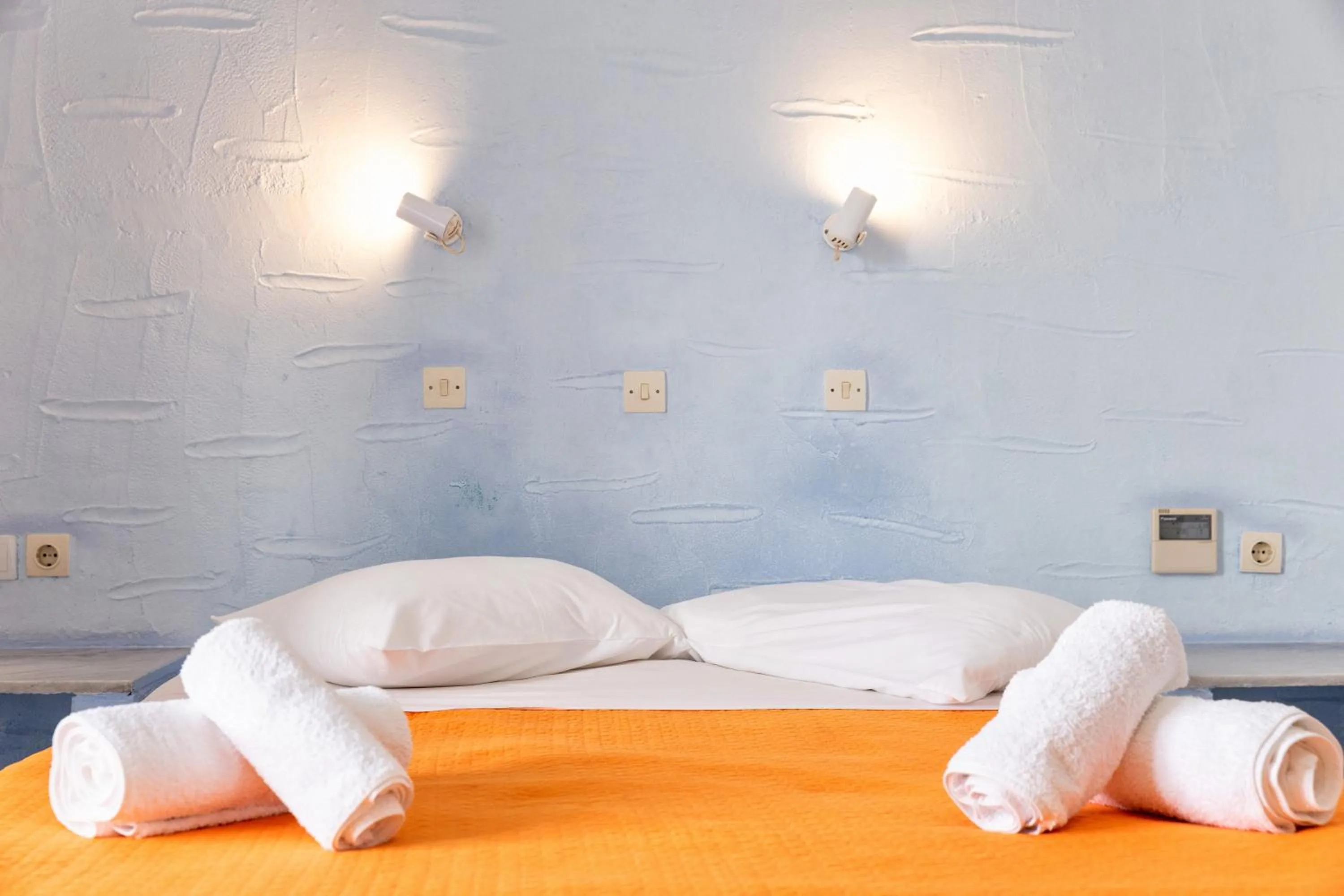 Bed in Stratos Apartments & Studios