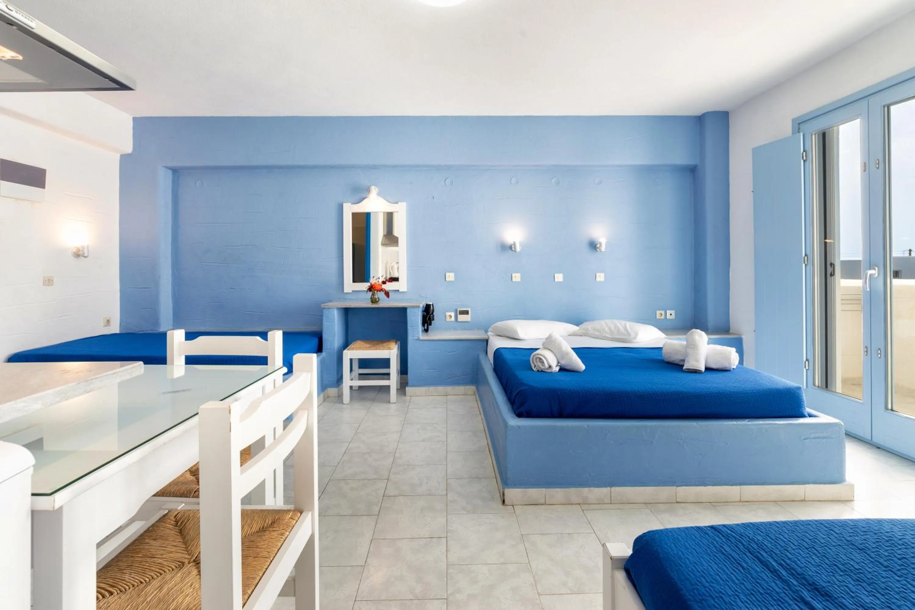 Bed in Stratos Apartments & Studios