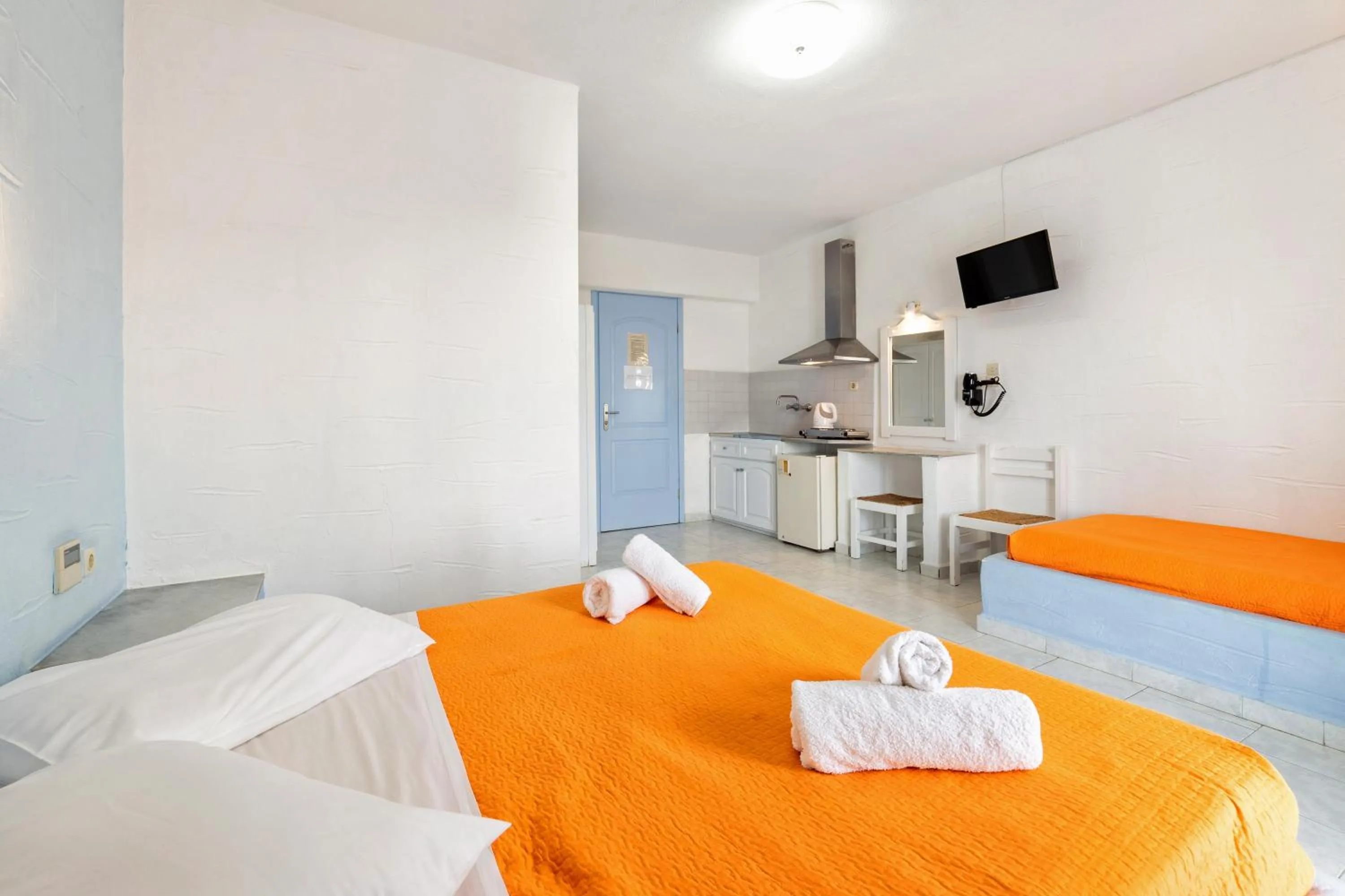 Bed in Stratos Apartments & Studios