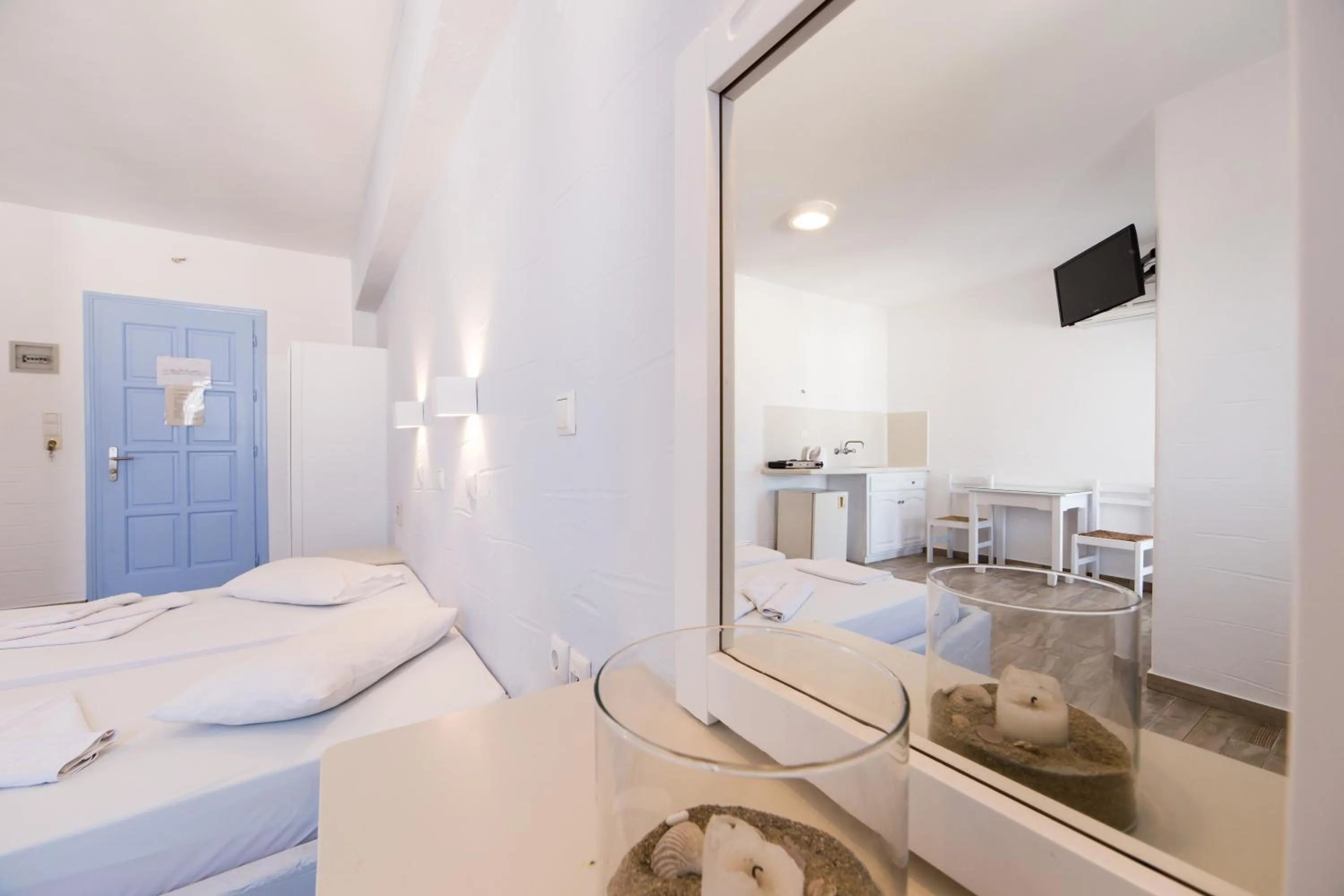 Bed in Stratos Apartments & Studios