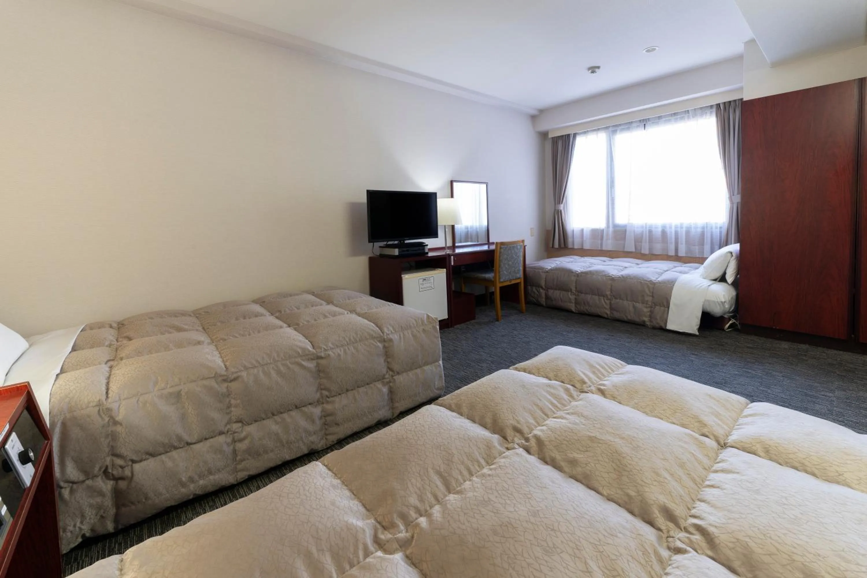 Photo of the whole room, Bed in Ise City Hotel
