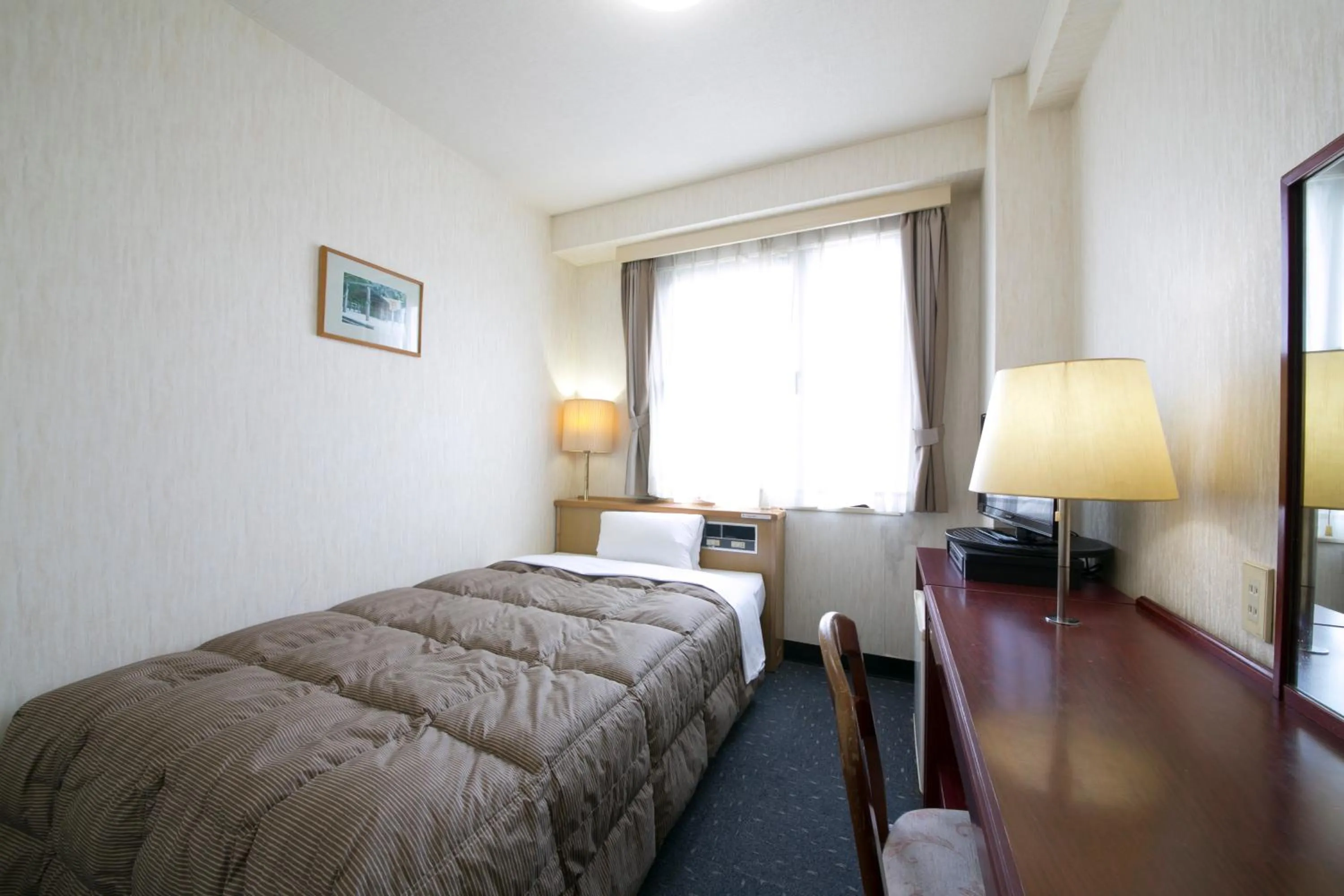 Photo of the whole room, Bed in Ise City Hotel