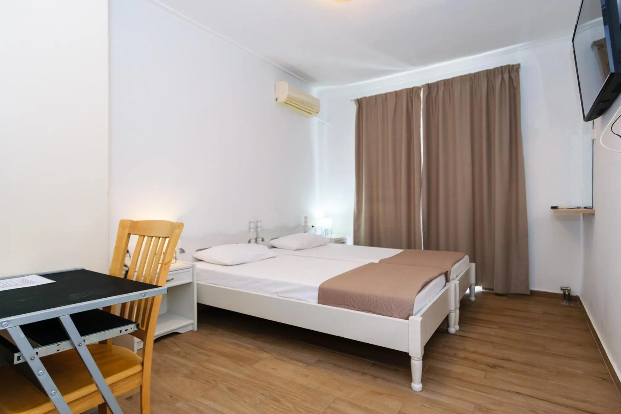 Bed in Archontiki City Hotel