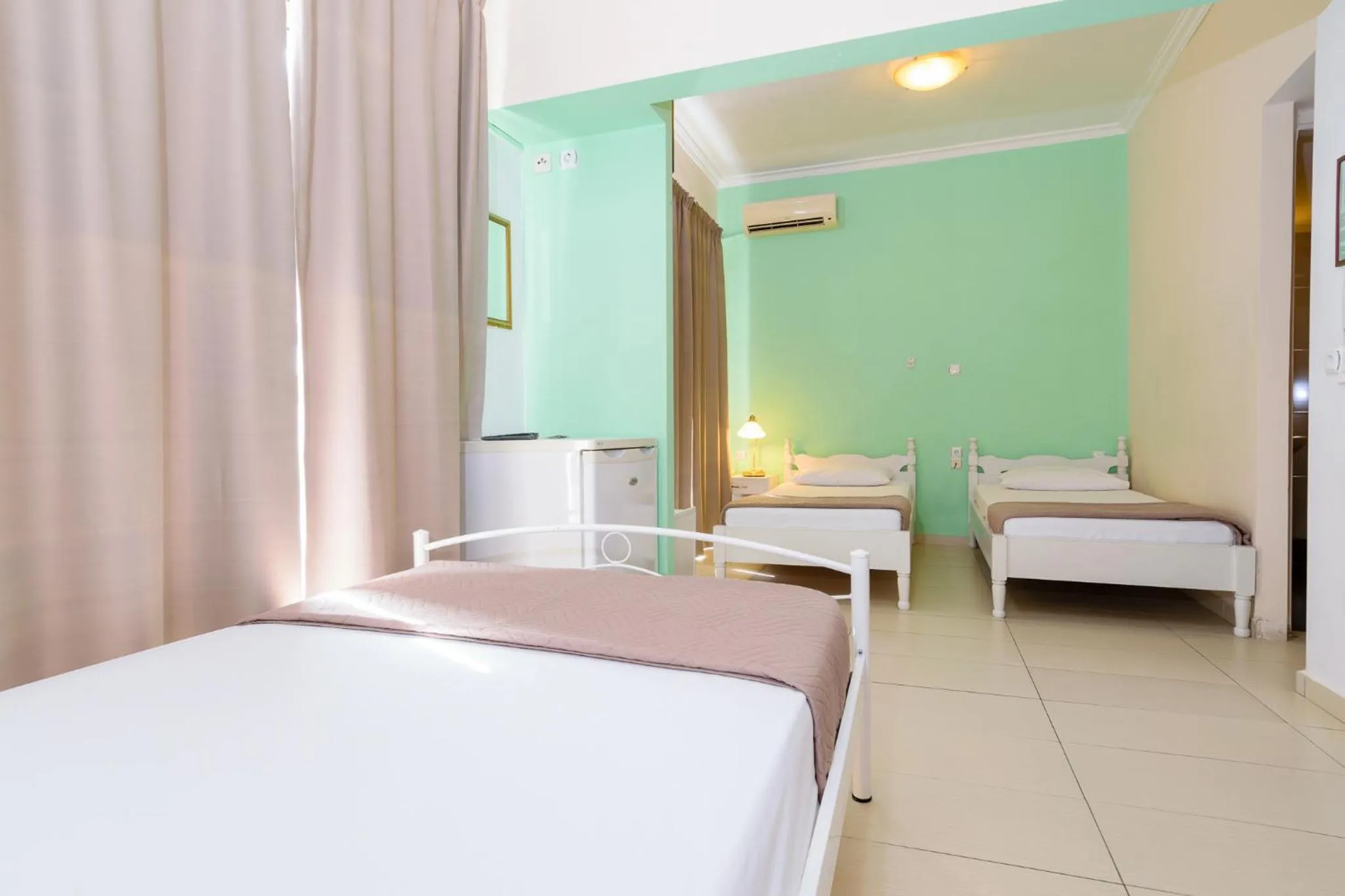 Bed in Archontiki City Hotel