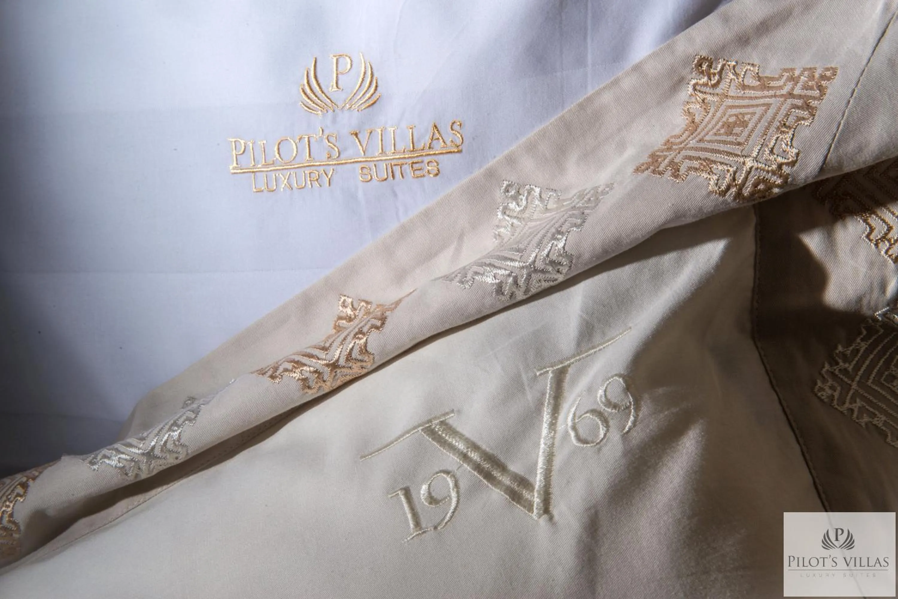 Property logo or sign in Pilot's Villas Luxury Suites