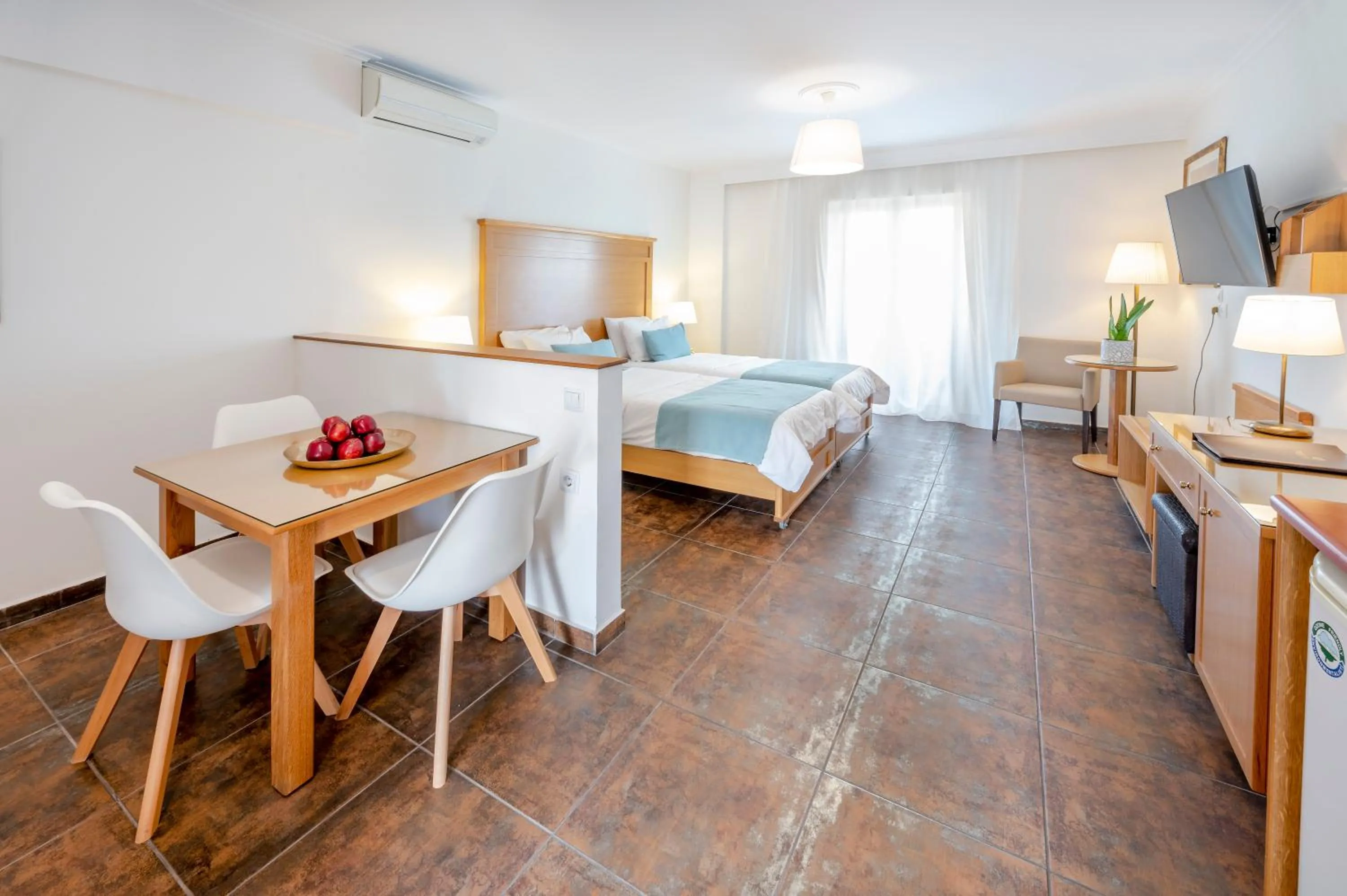 Bed in Peridis Family Resort