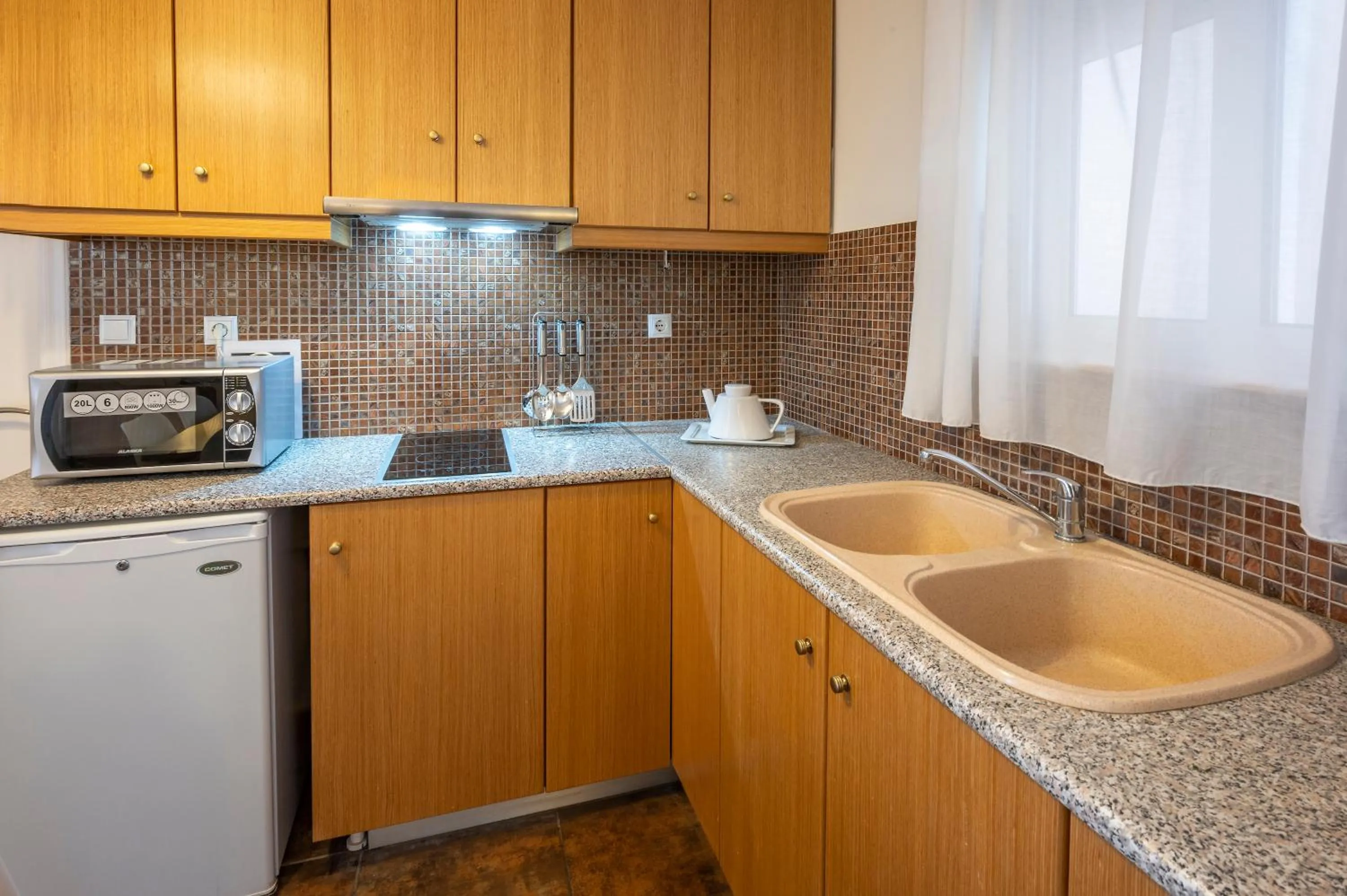 Kitchen or kitchenette in Peridis Family Resort