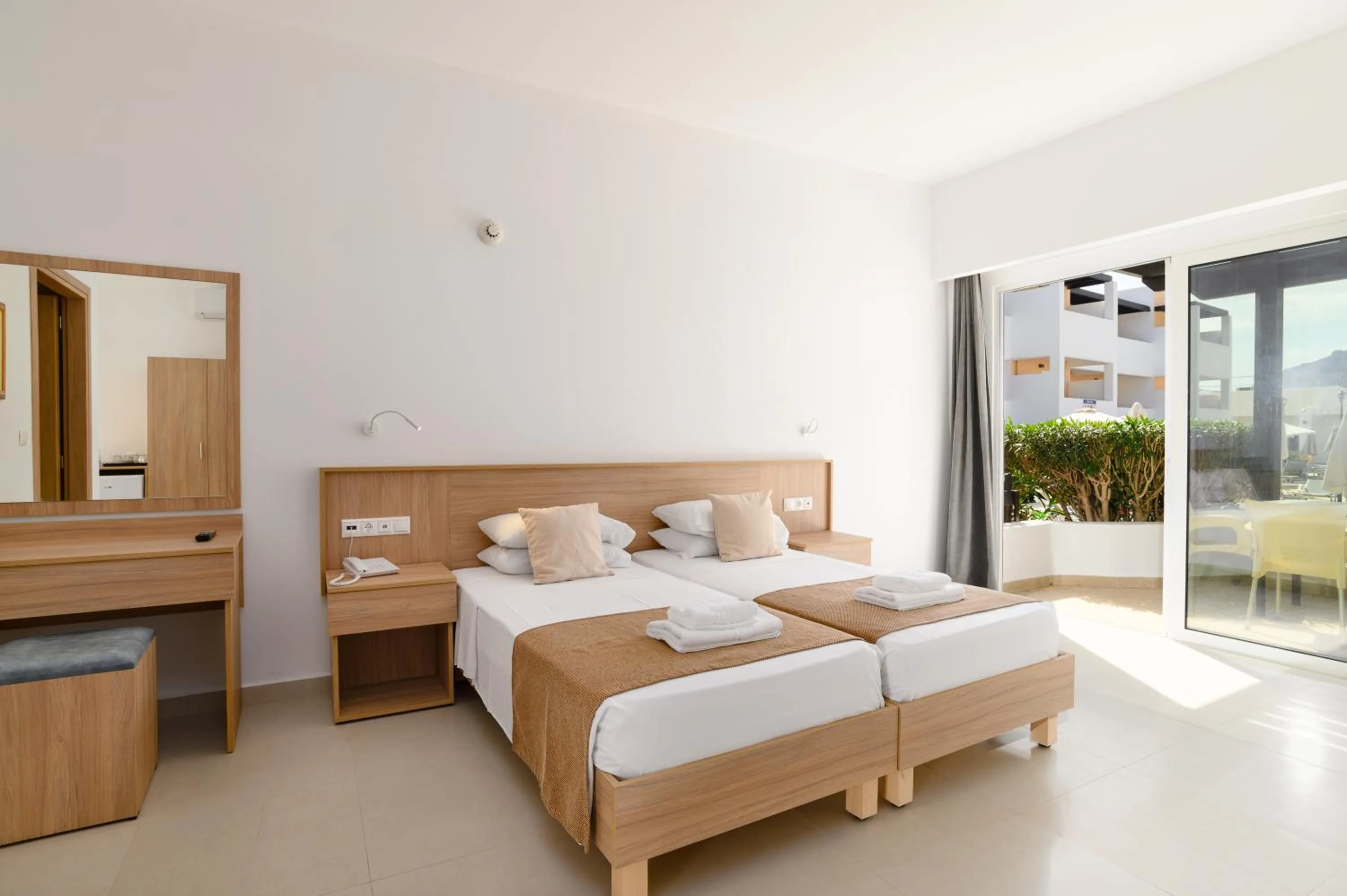 Bed in Matina Pefkos Aparthotel