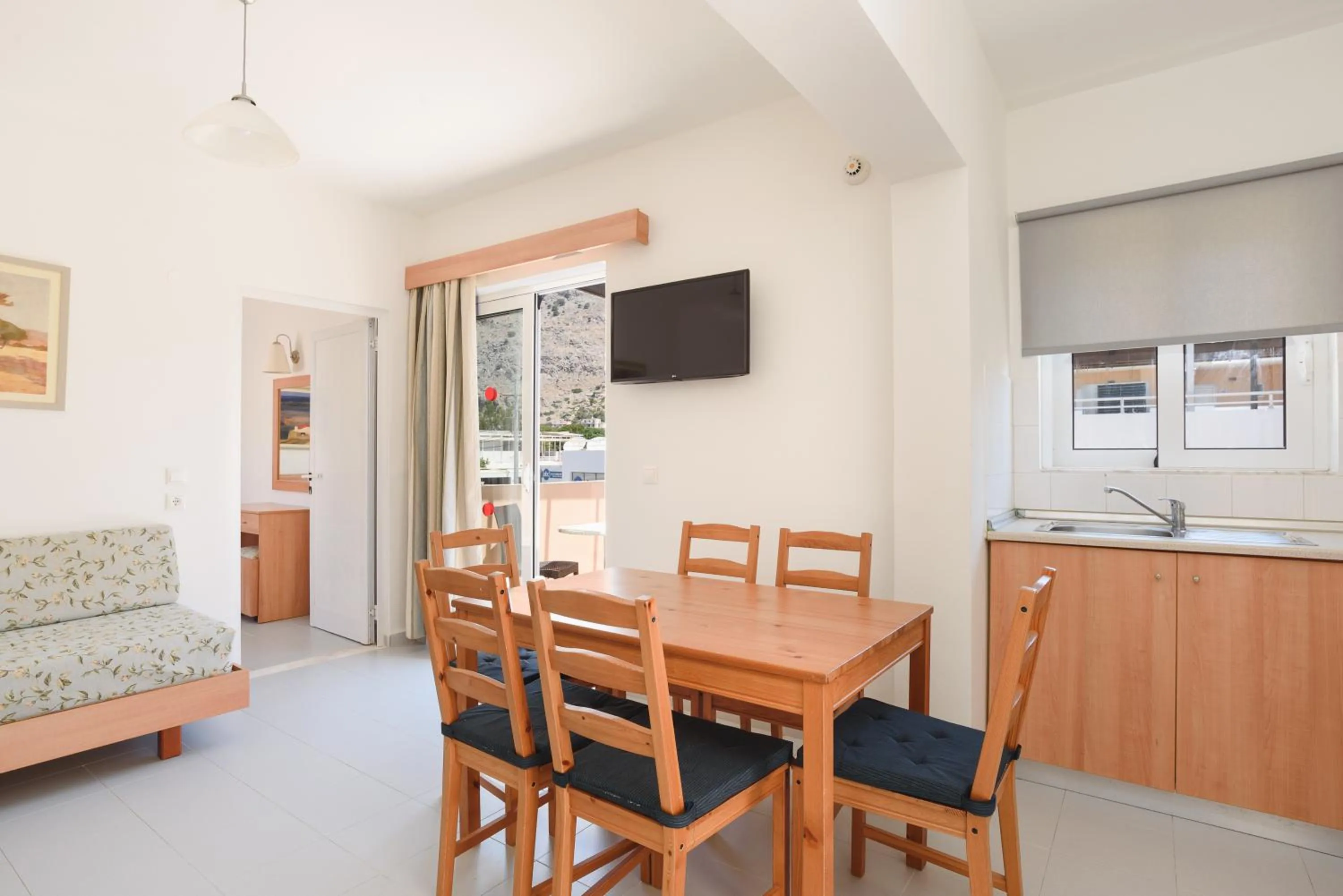 Kitchen or kitchenette in Matina Pefkos Aparthotel