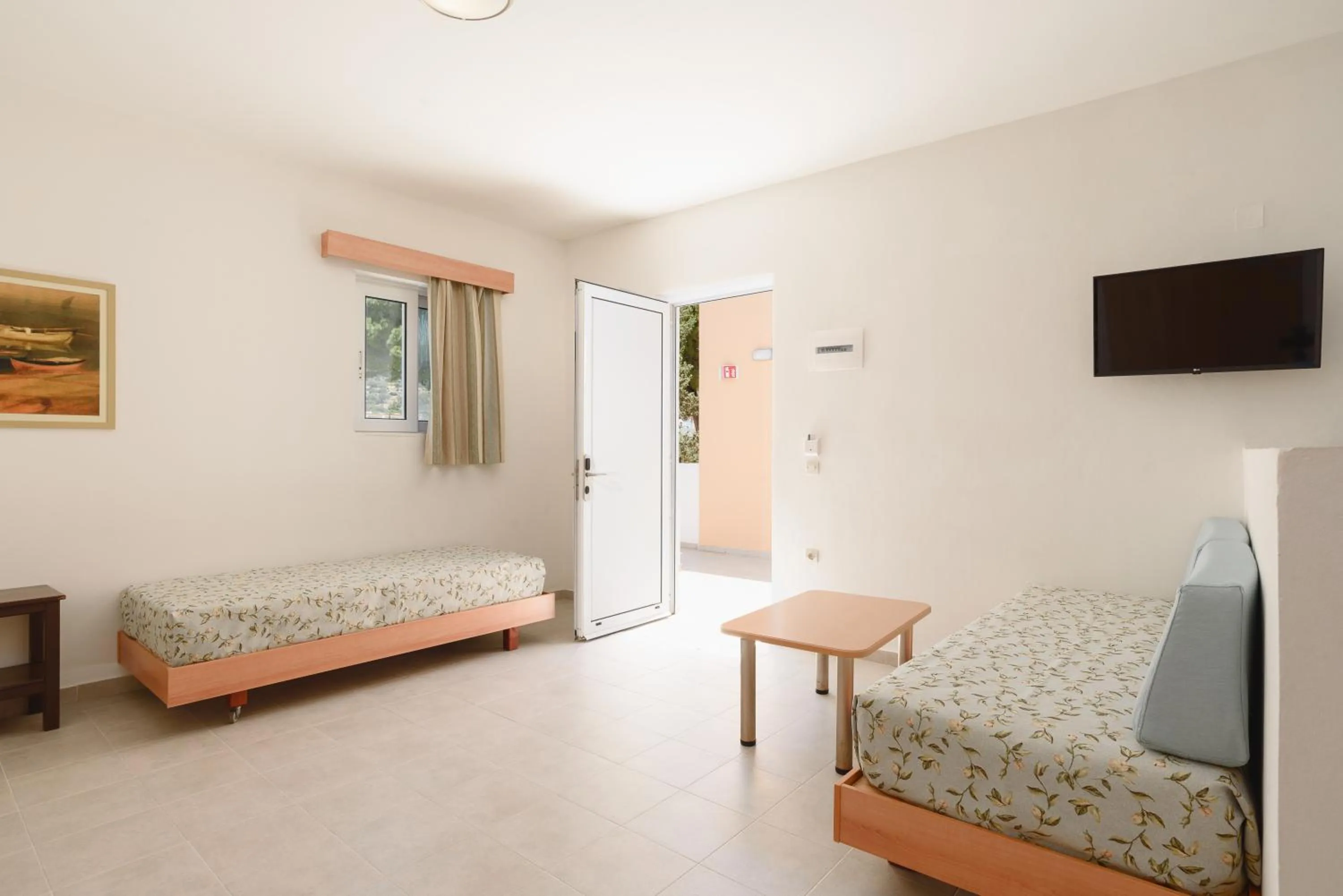 Bed in Matina Pefkos Aparthotel