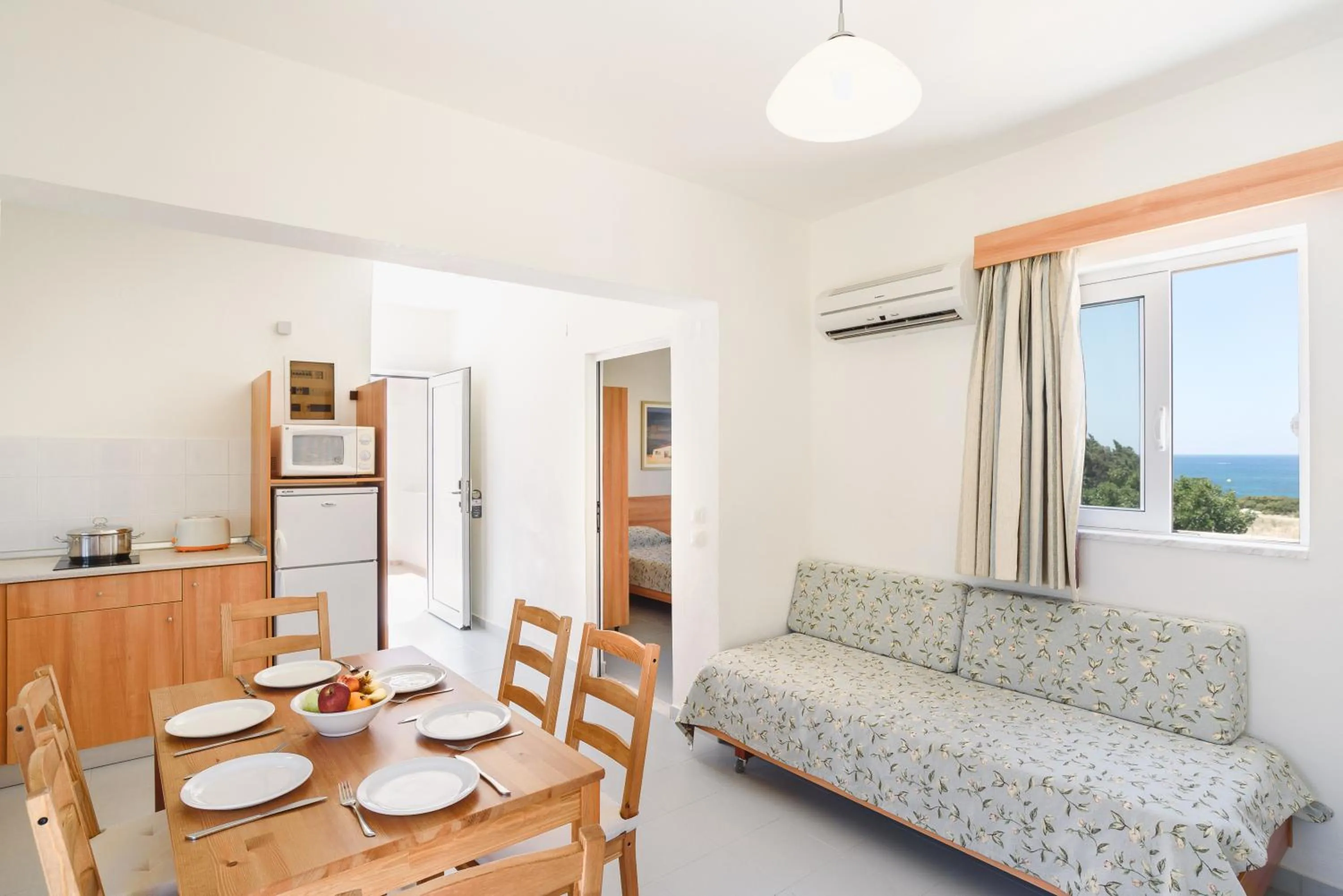 Kitchen or kitchenette in Matina Pefkos Aparthotel