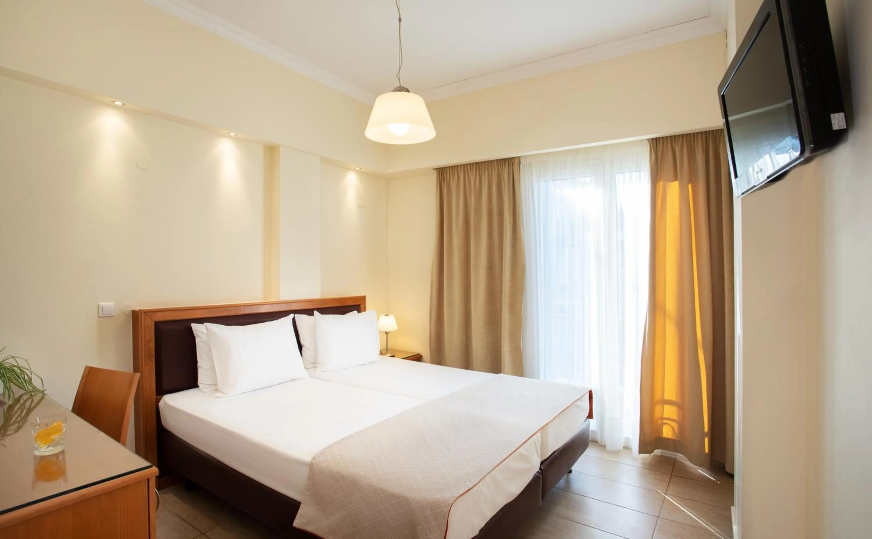 Bed in Pantheon City Hotel