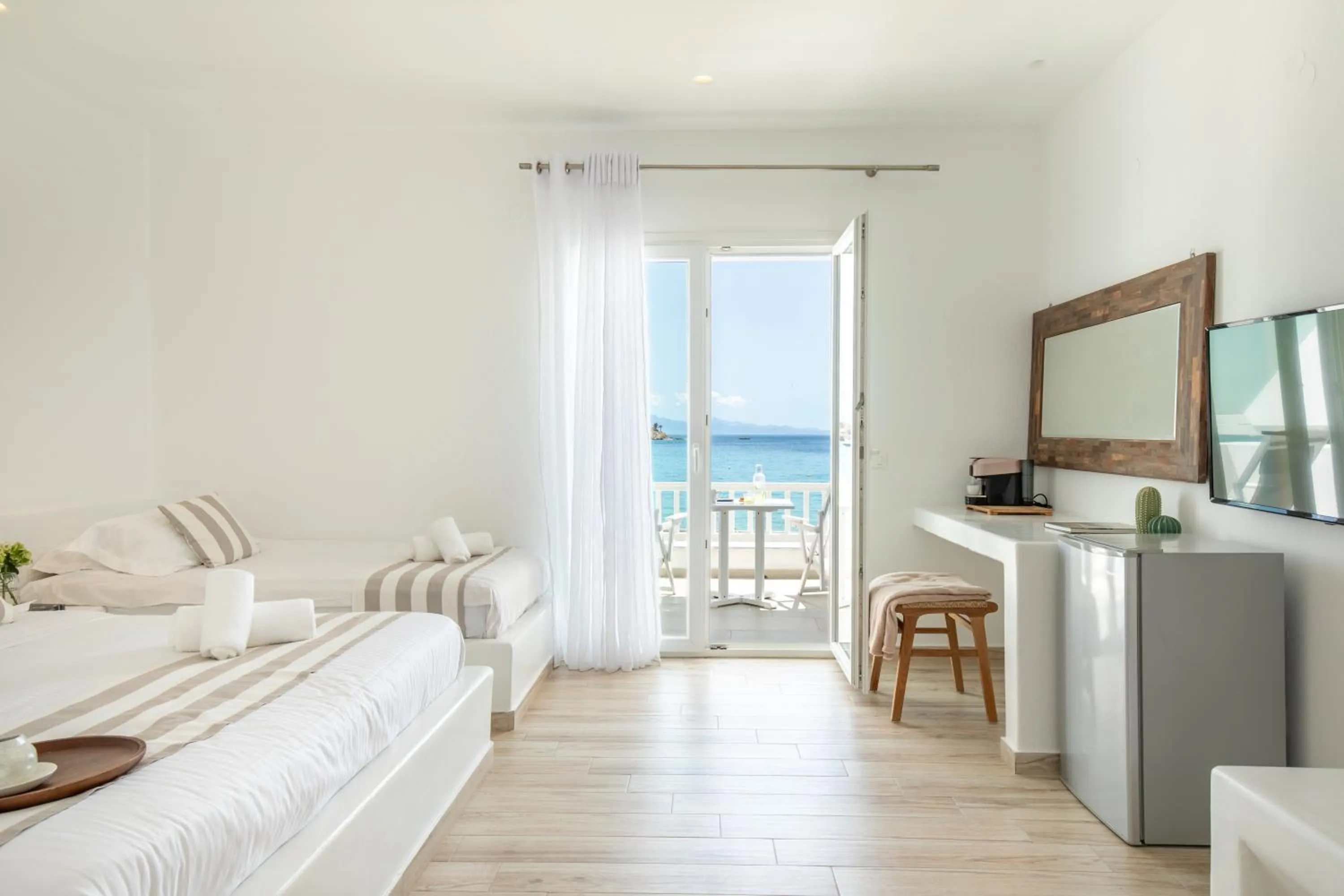 Bed in Acrogiali Beachfront Hotel Mykonos