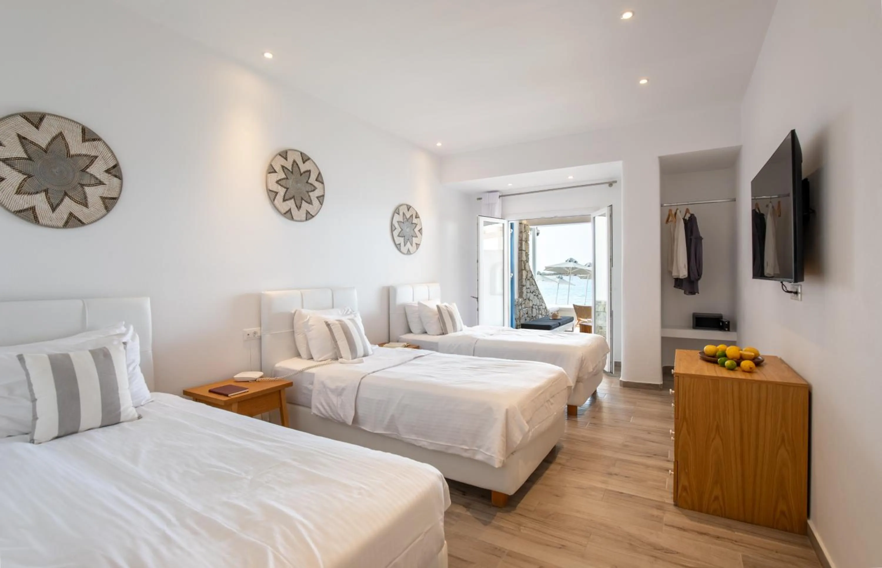 Bed in Acrogiali Beachfront Hotel Mykonos