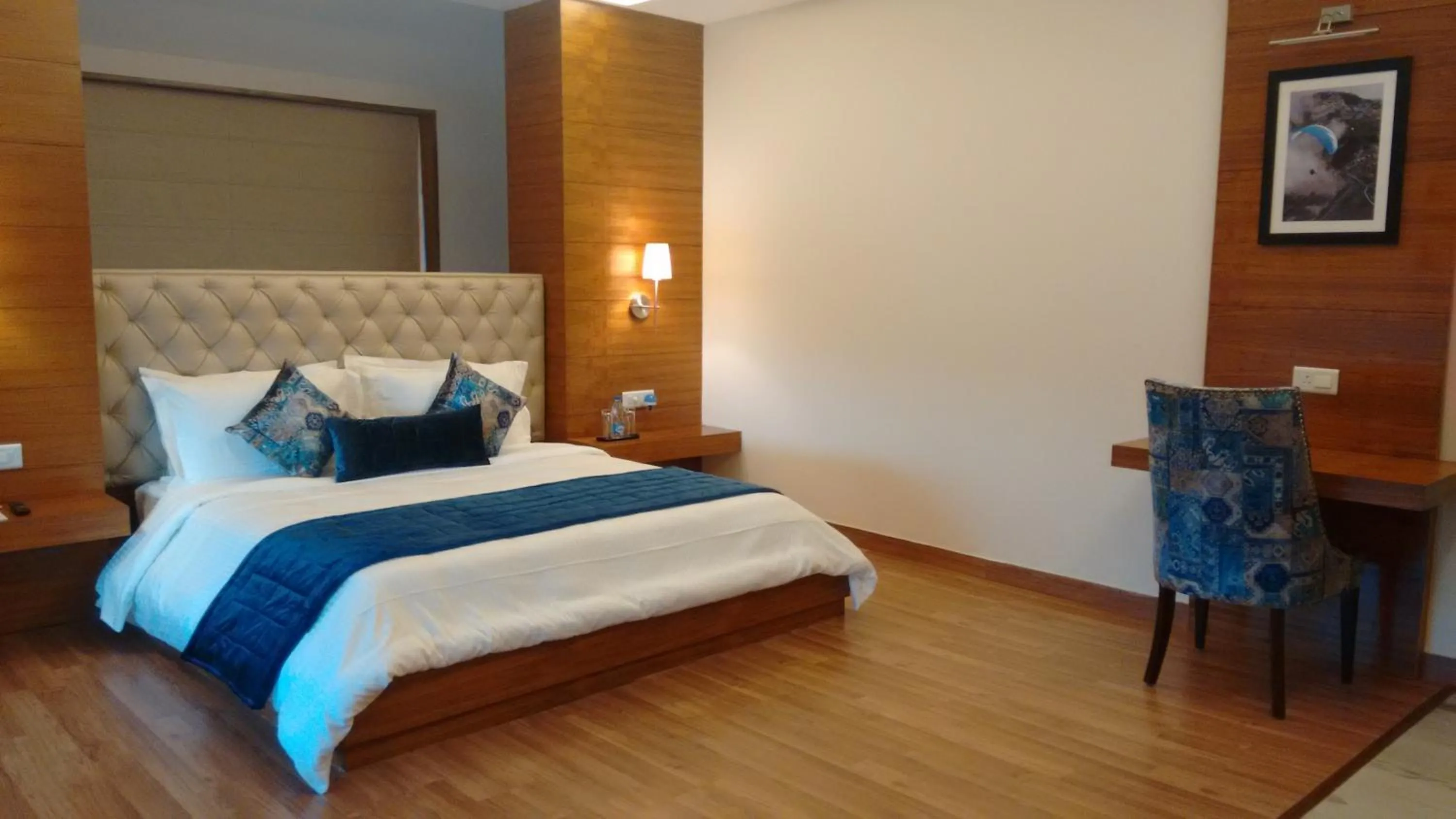 Photo of the whole room, Bed in RS Sarovar Portico