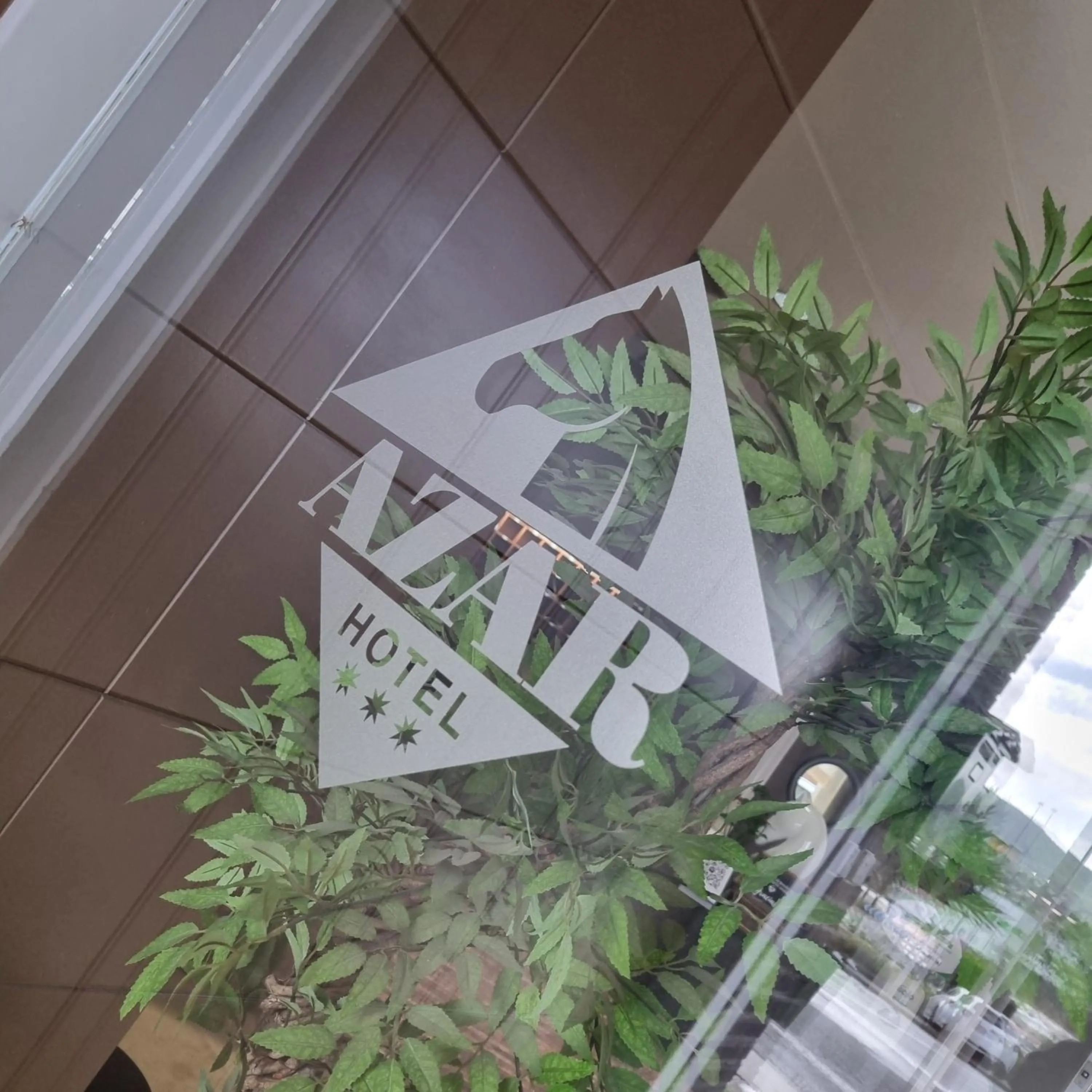 Property logo or sign in Hotel Azar