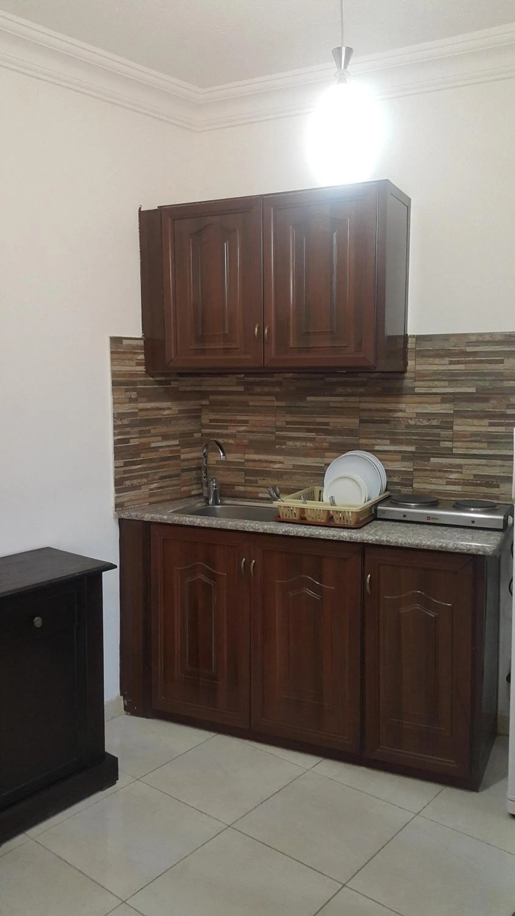 Kitchen or kitchenette in Al Fakher Hotel Apartments & Suites
