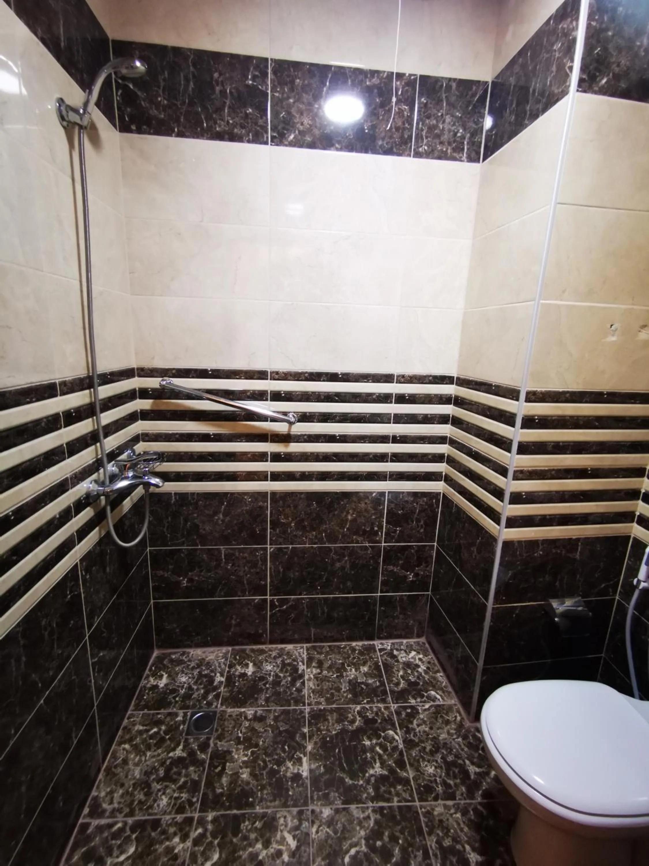 Bathroom in Al Fakher Hotel Apartments & Suites