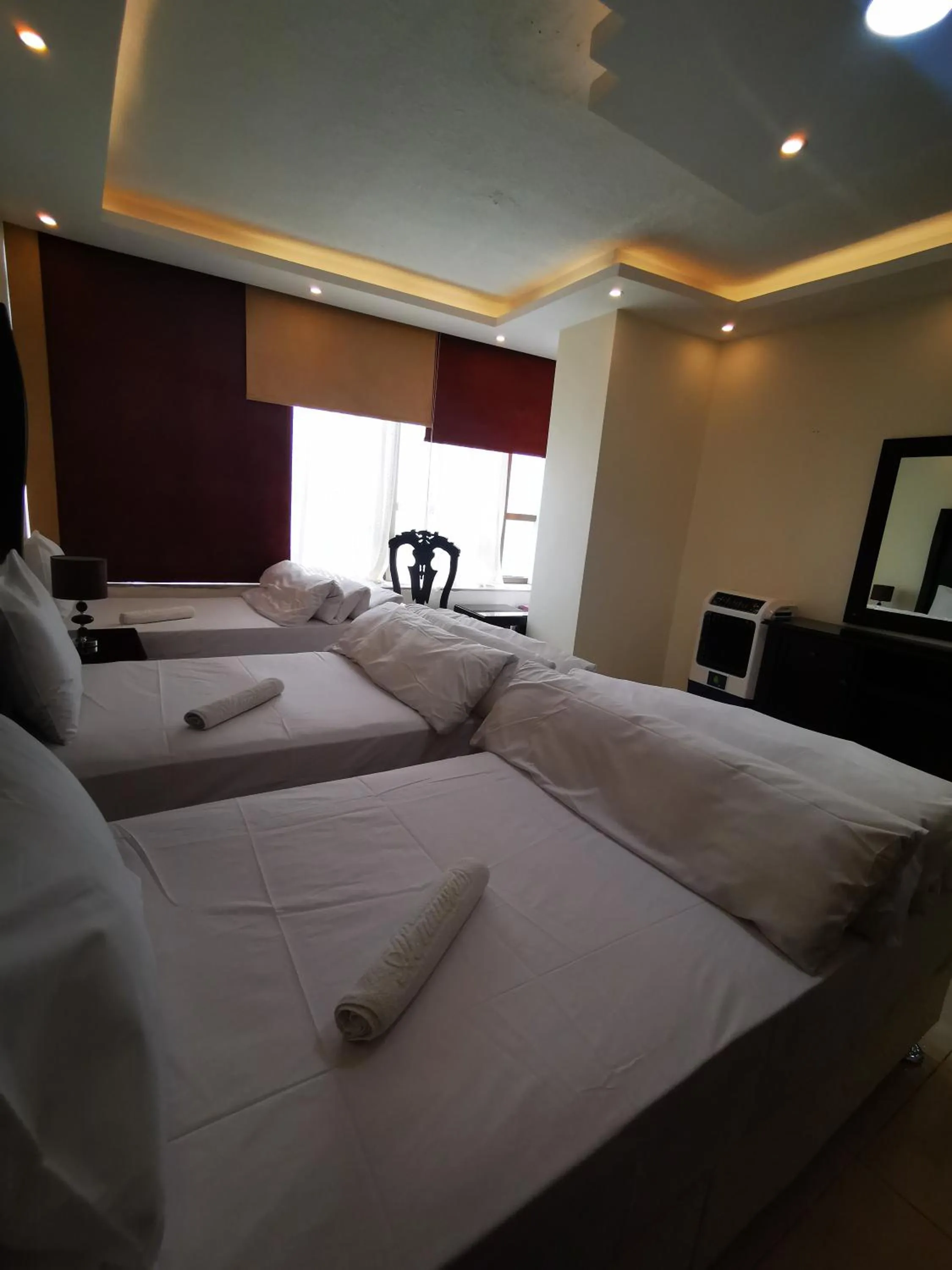 Bed in Al Fakher Hotel Apartments & Suites