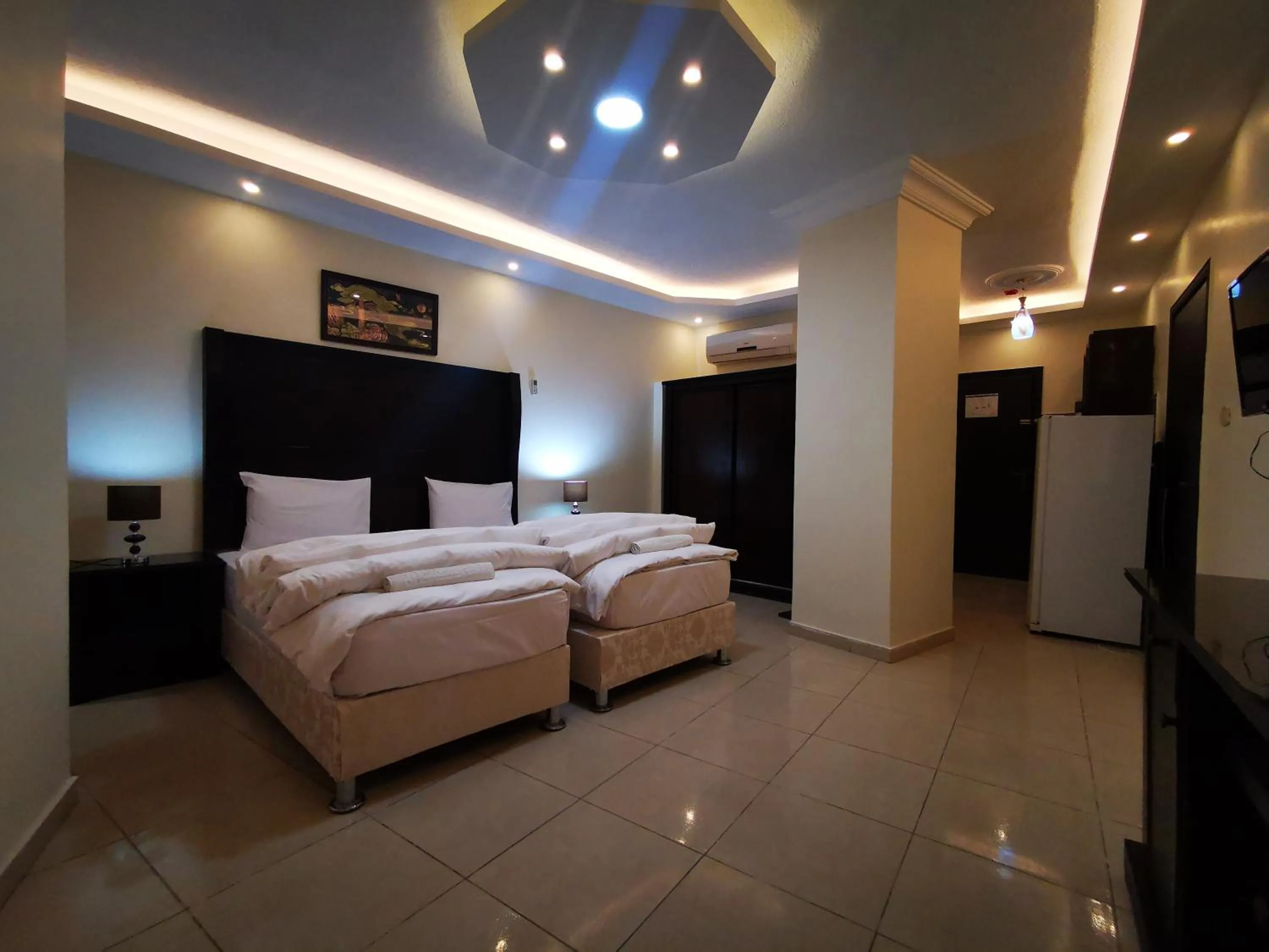 Bed in Al Fakher Hotel Apartments & Suites