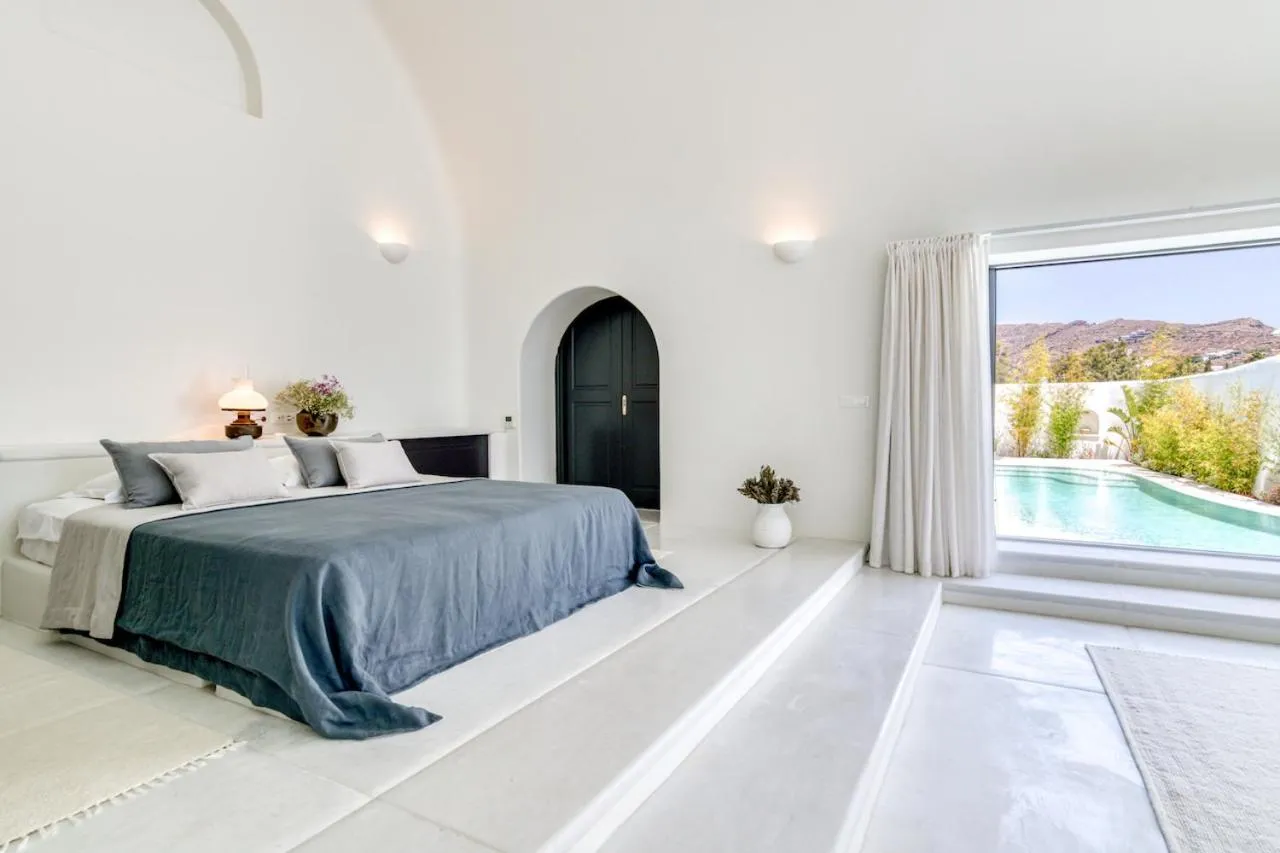 Bed in Perivolas Hotel