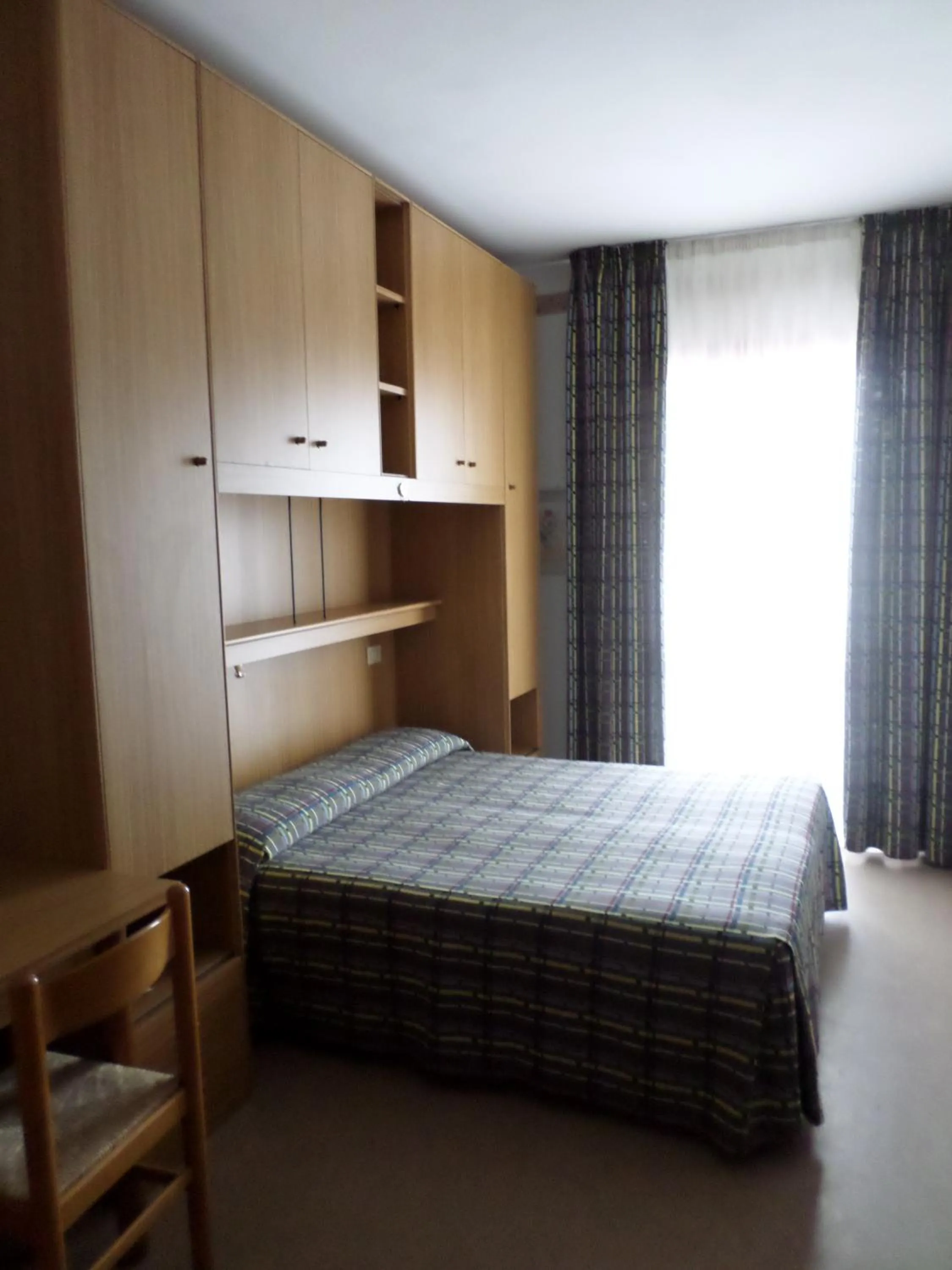 Photo of the whole room, Bed in Daina Residence