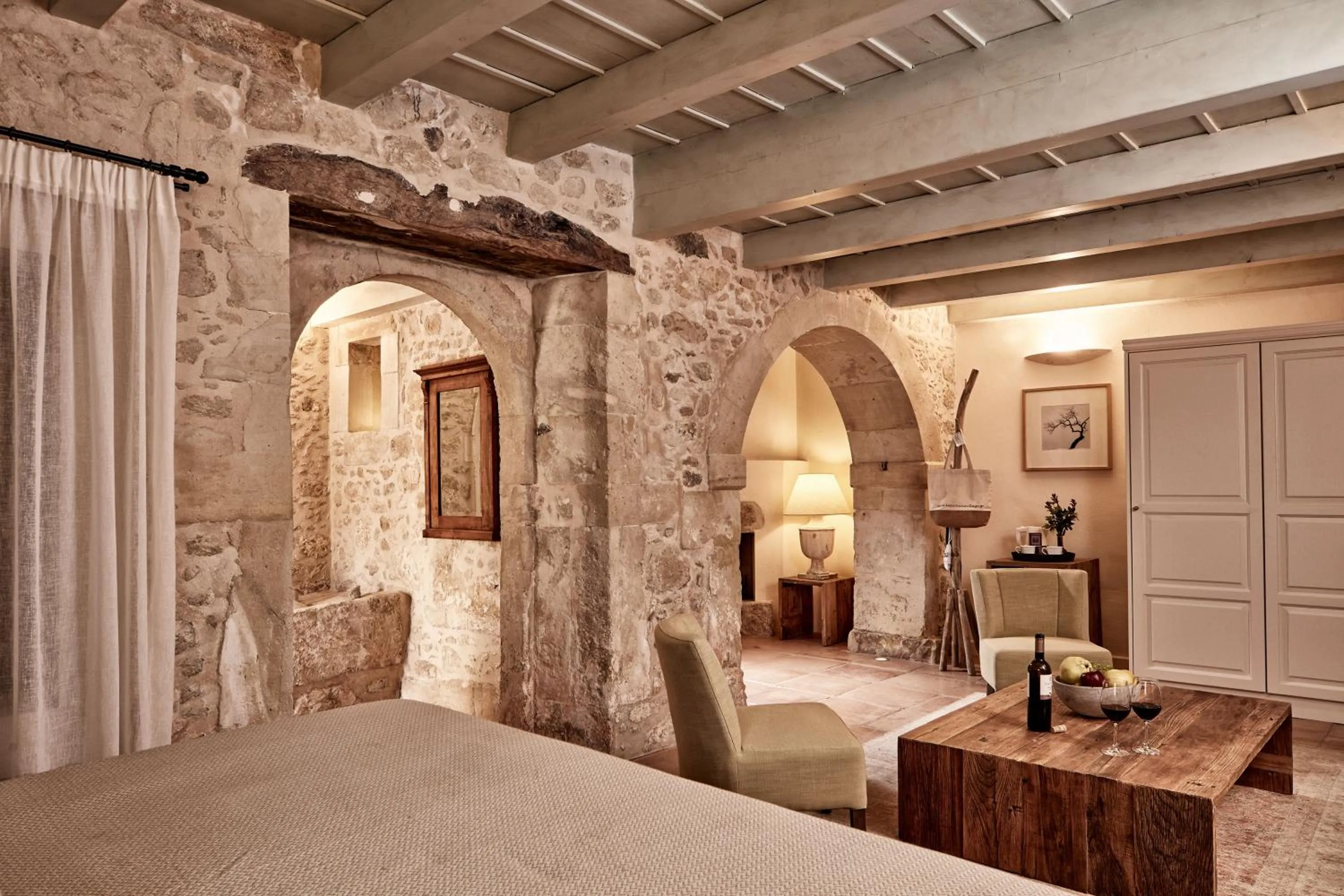 Seating area, Bed in Kapsaliana Village Hotel