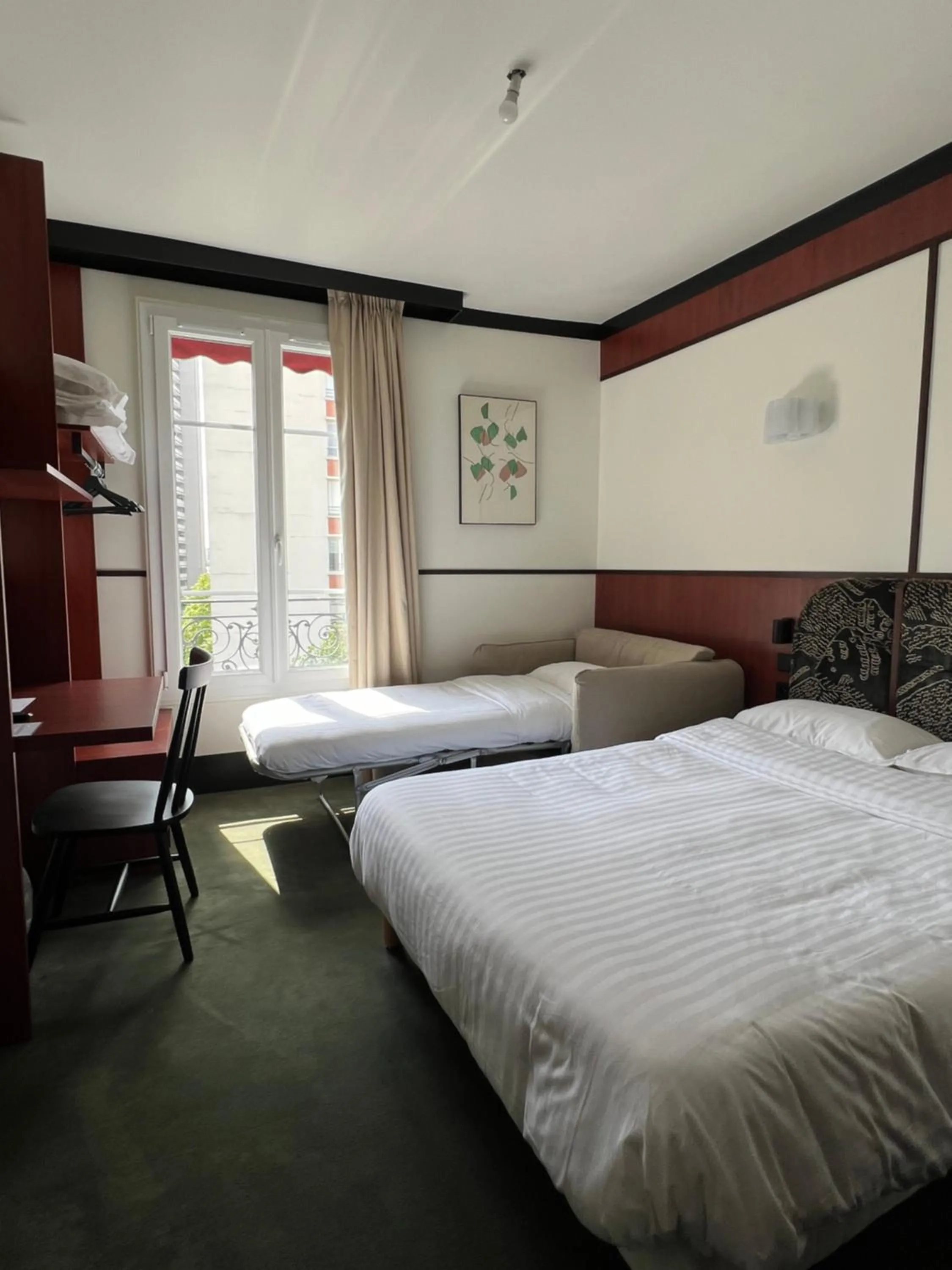 Photo of the whole room, Bed in Hôtel Marguerite
