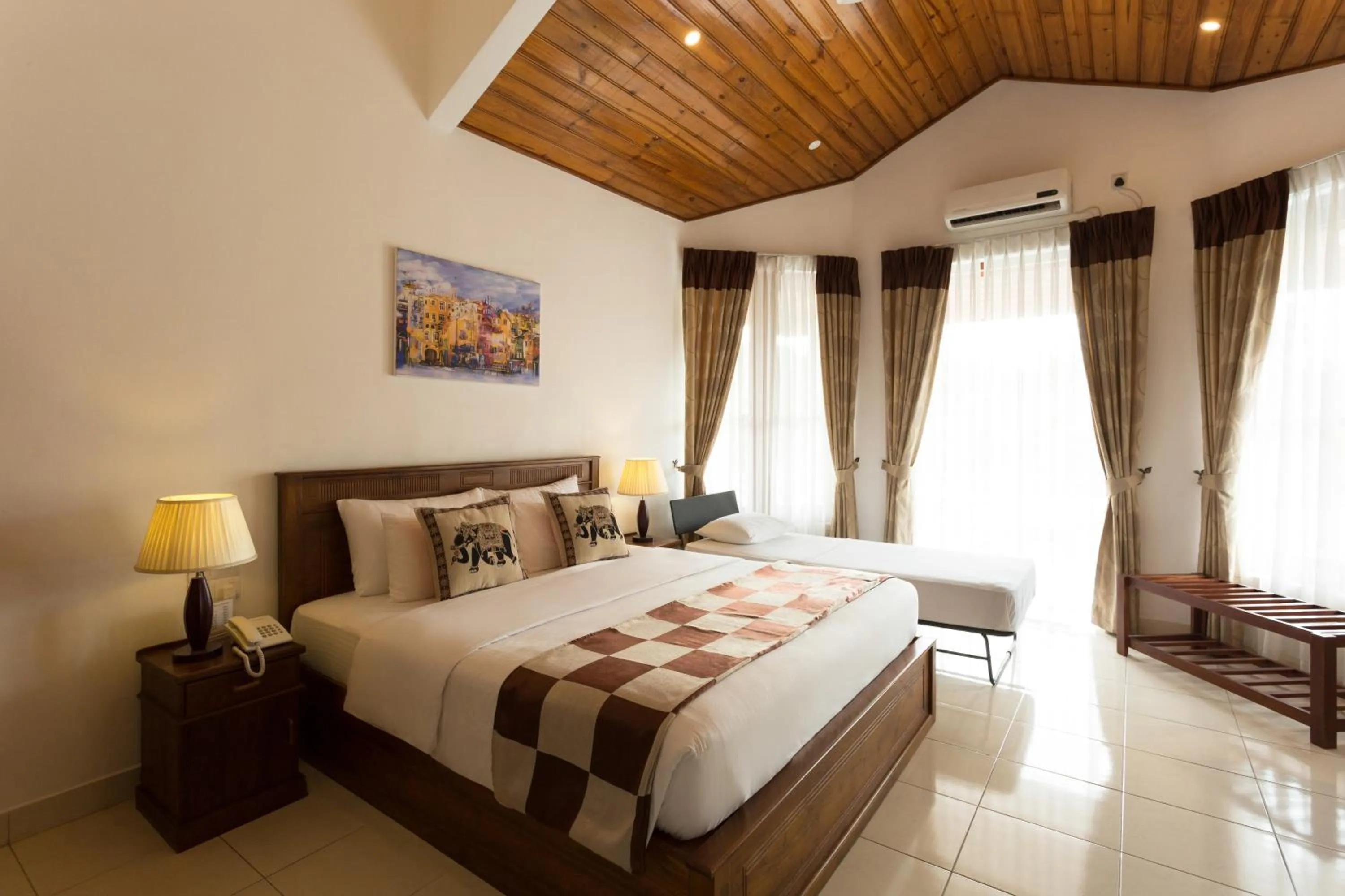 Bed in Orchid Villa Kandy