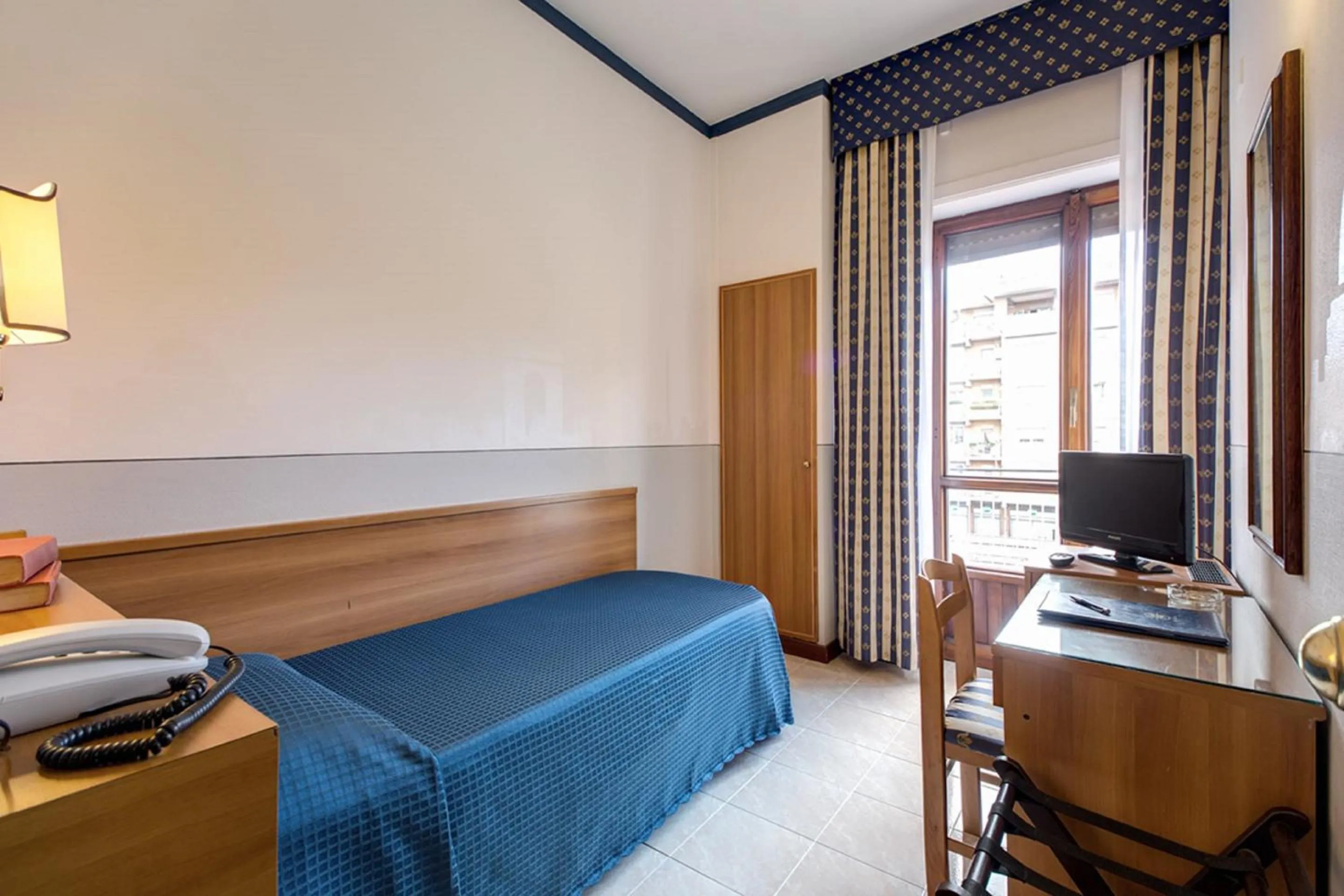 Bed in Hotel Pacific