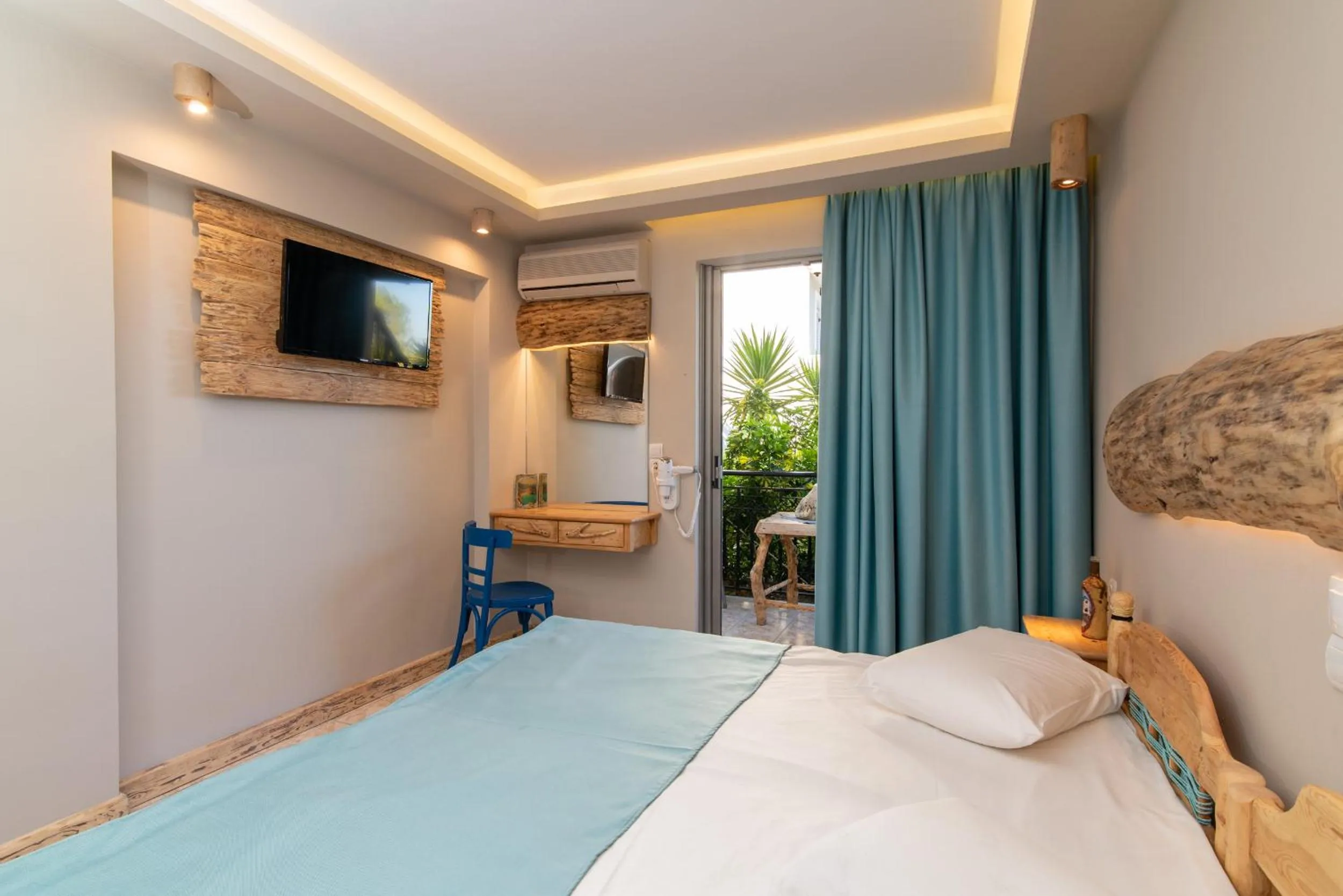 Photo of the whole room, Bed in Iniohos Zante Hotel & Suites