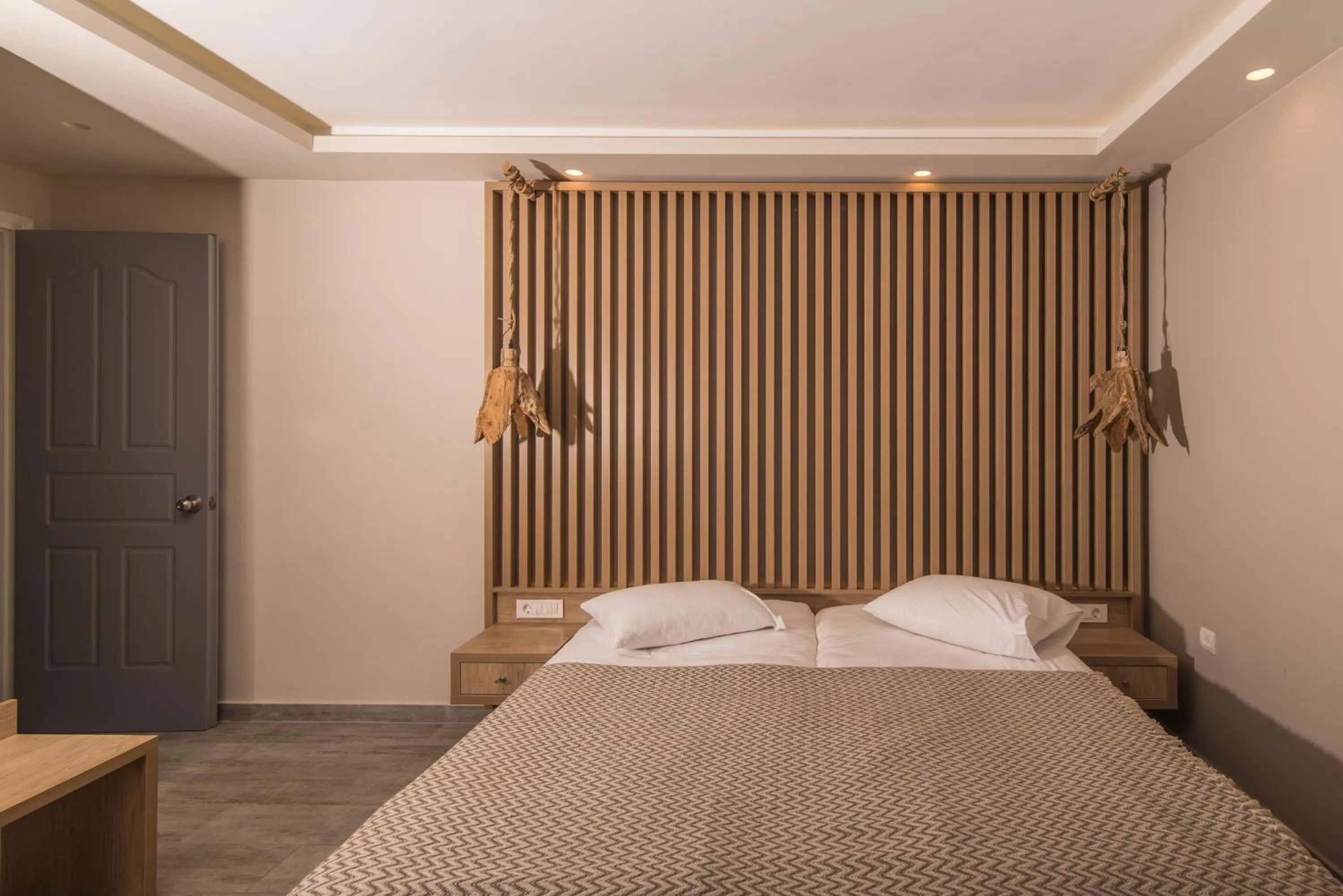 Photo of the whole room, Bed in Iniohos Zante Hotel & Suites