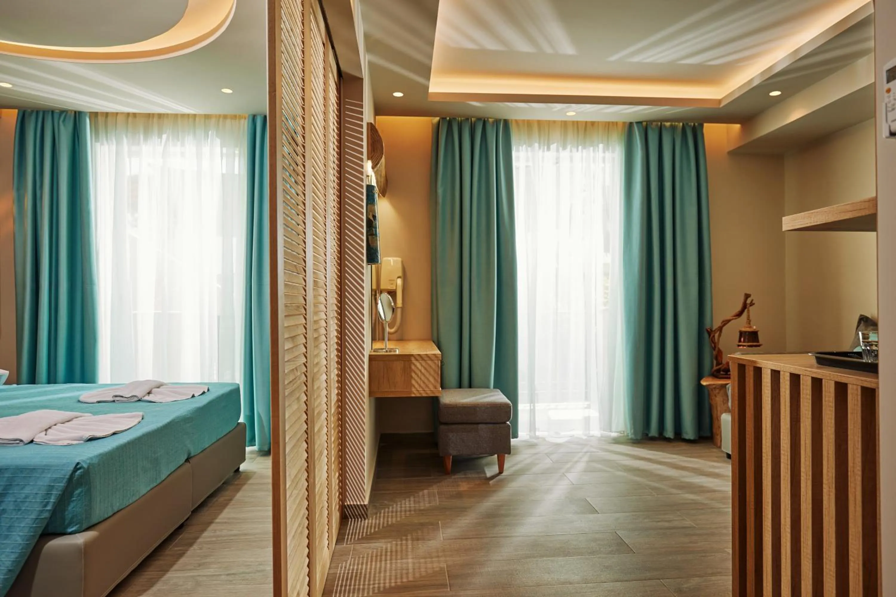 Photo of the whole room, Bed in Iniohos Zante Hotel & Suites