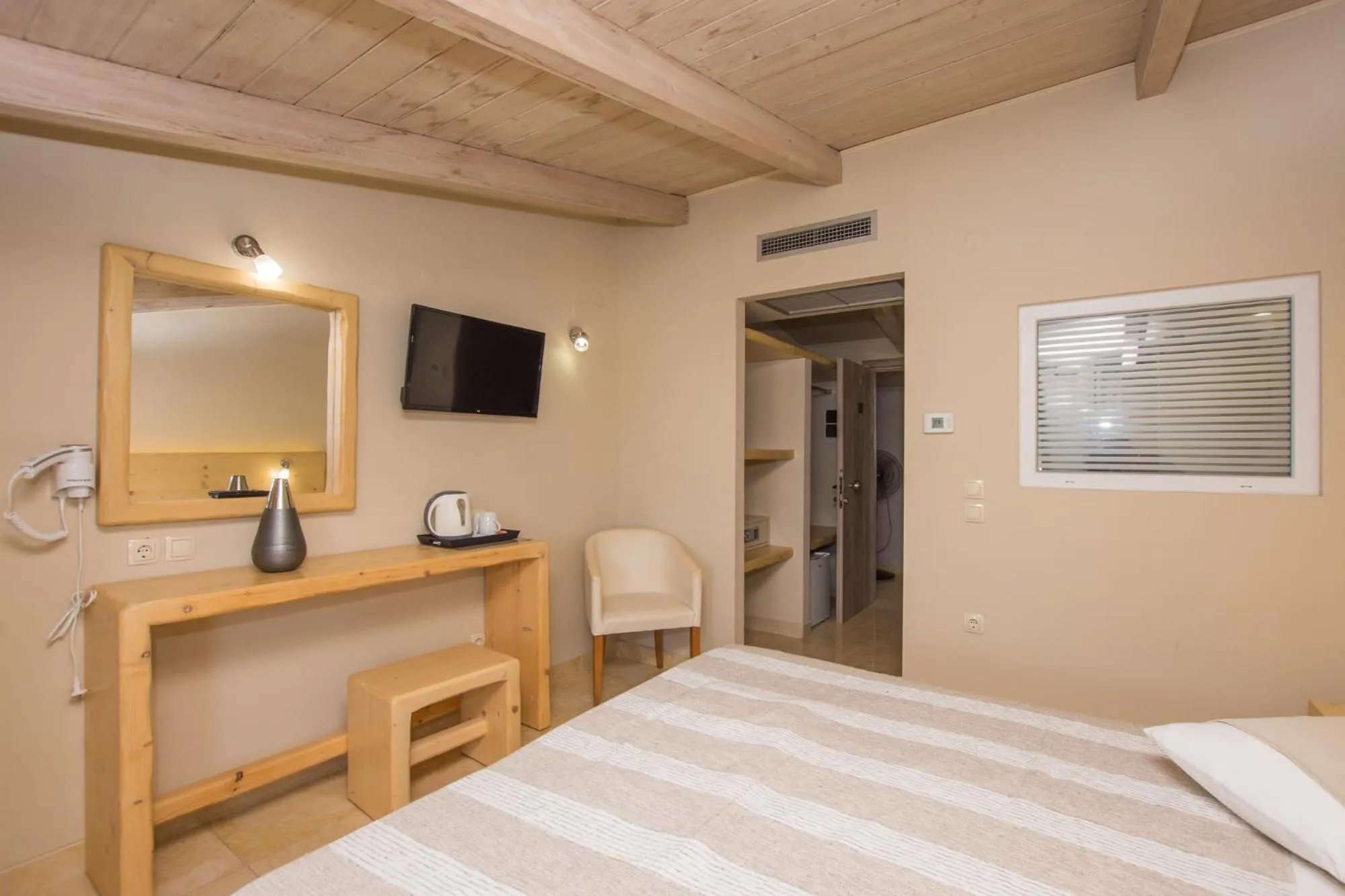 Photo of the whole room, Bed in Iniohos Zante Hotel & Suites