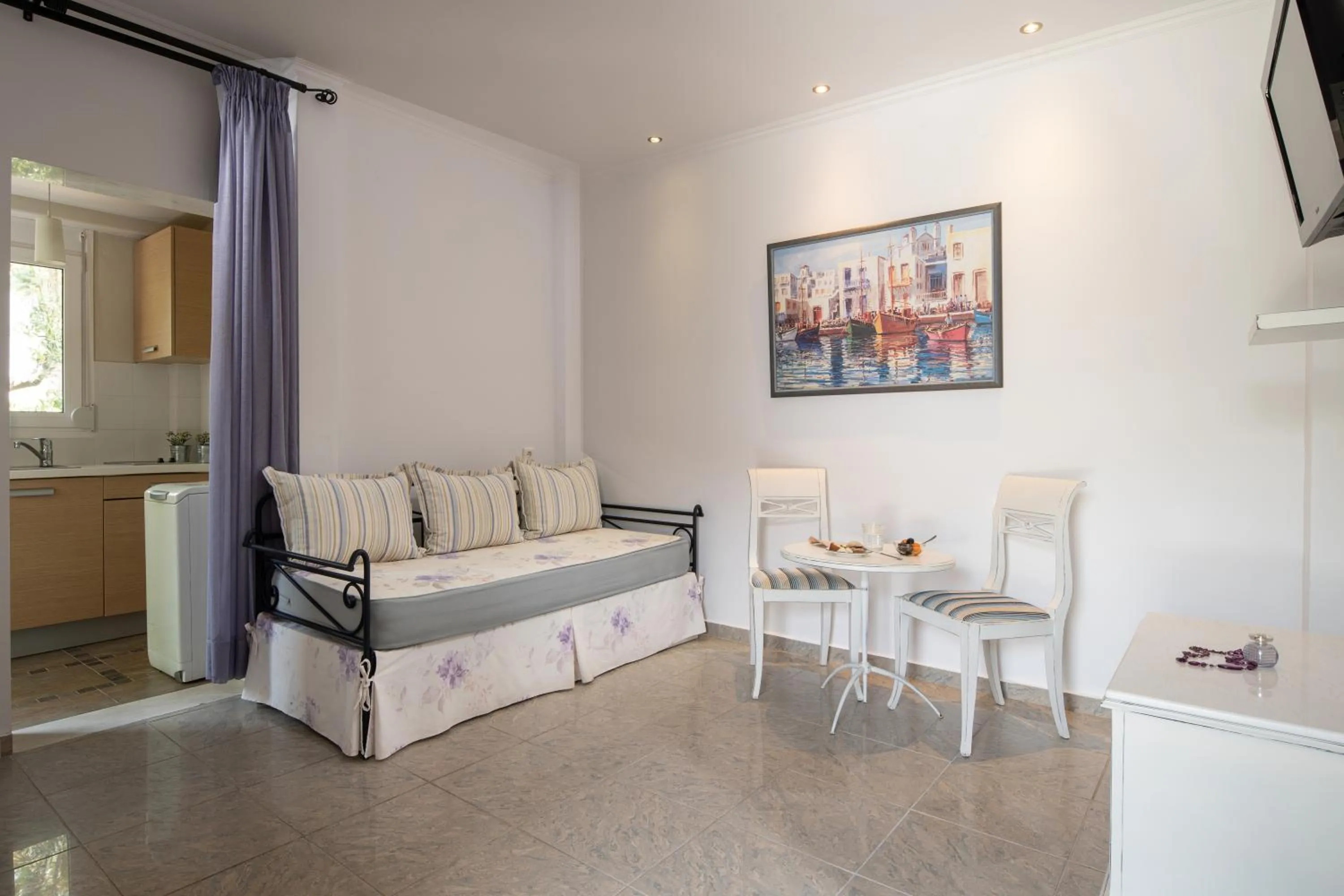 Seating area, Bed in Antigoni Seaside Resort