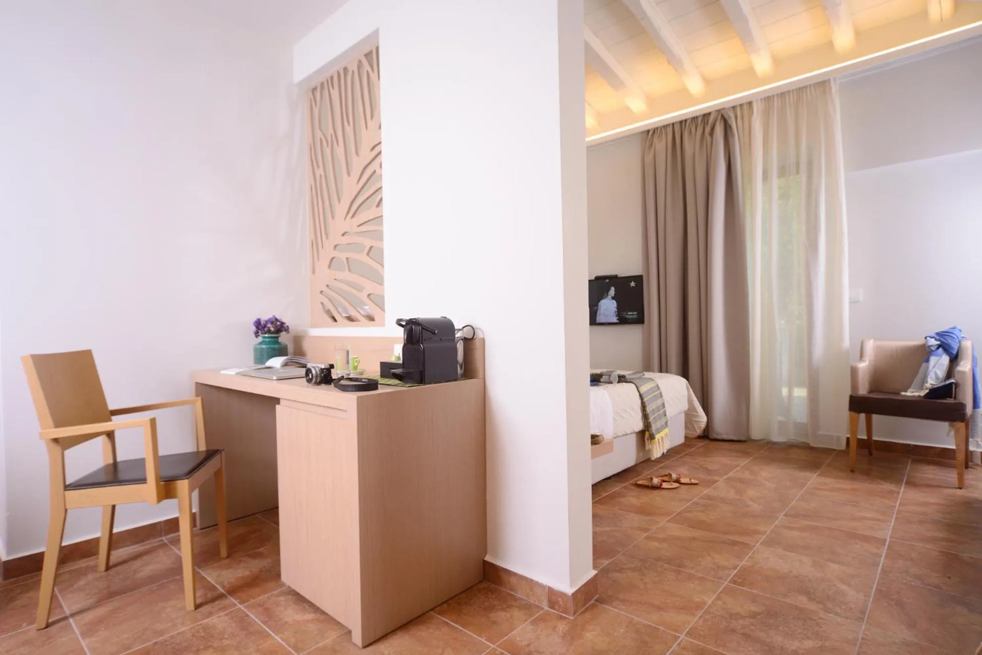 TV and multimedia in Varos Village Boutique Hotel