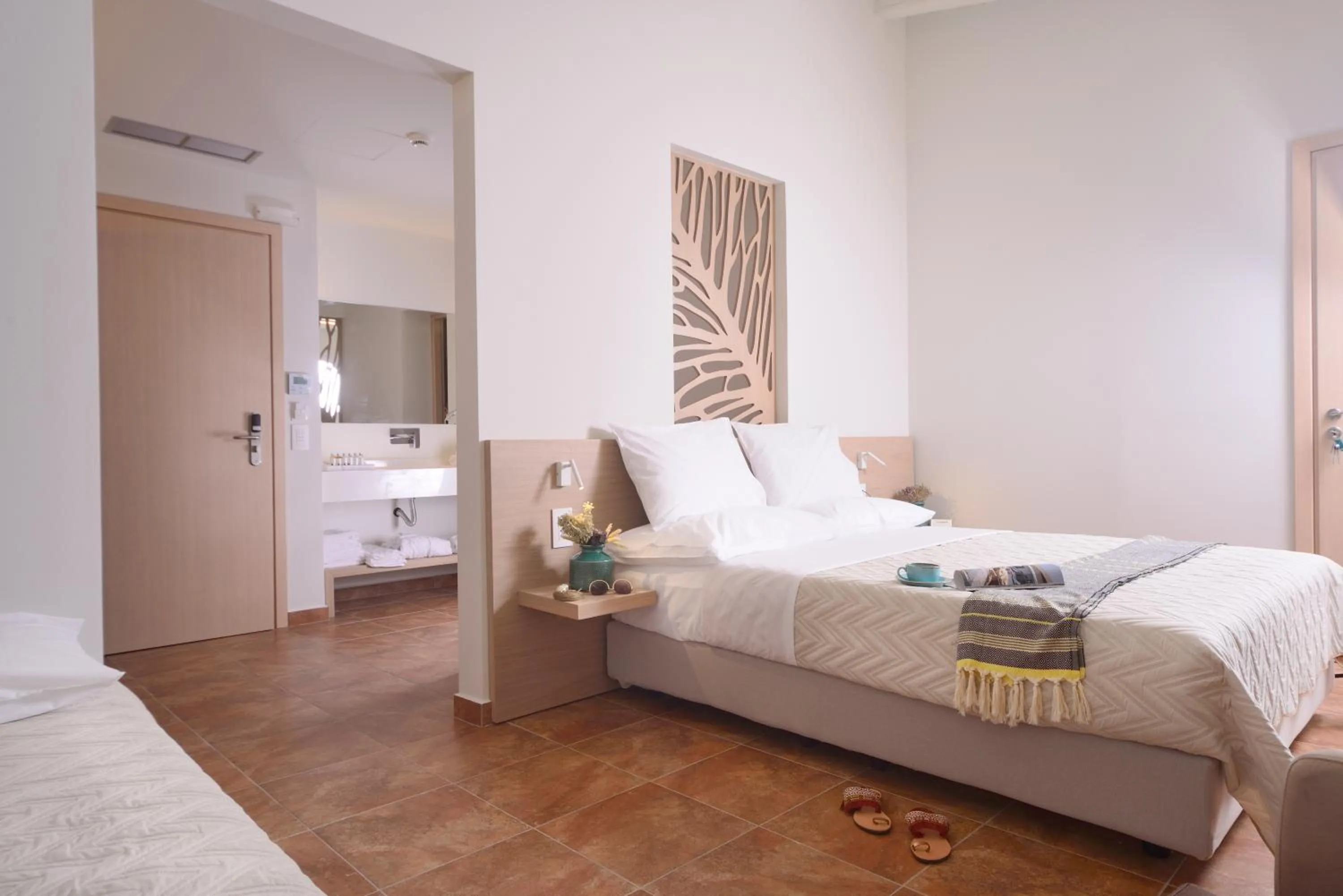 Bed in Varos Village Boutique Hotel