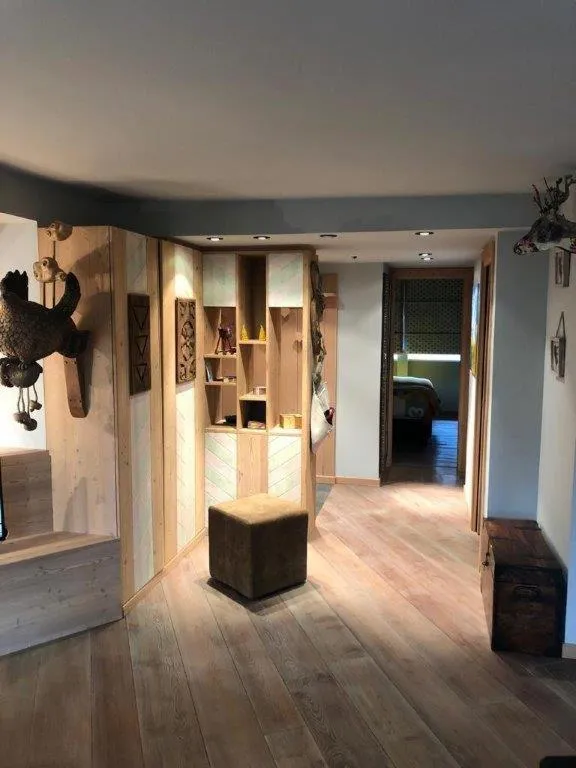 Living room in Aux Pieds du Roi - Suite & Spa