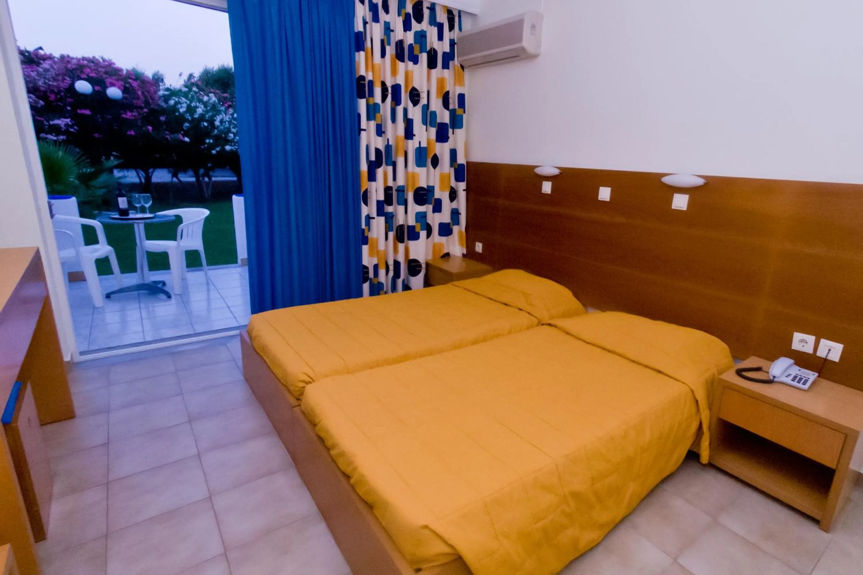 Bed in Hotel Tigaki's Star