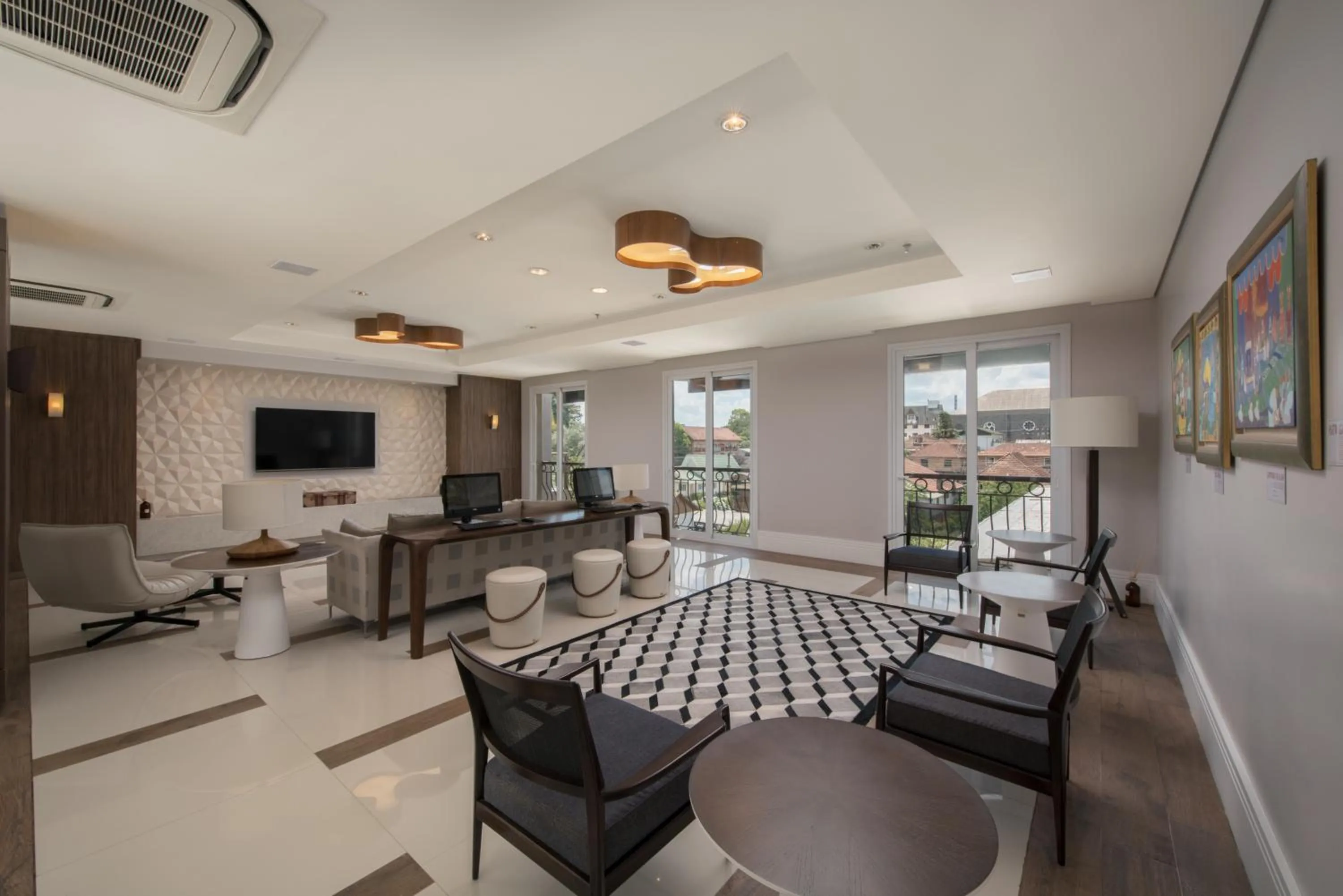 Communal lounge/ TV room in Prodigy Gramado by Wish