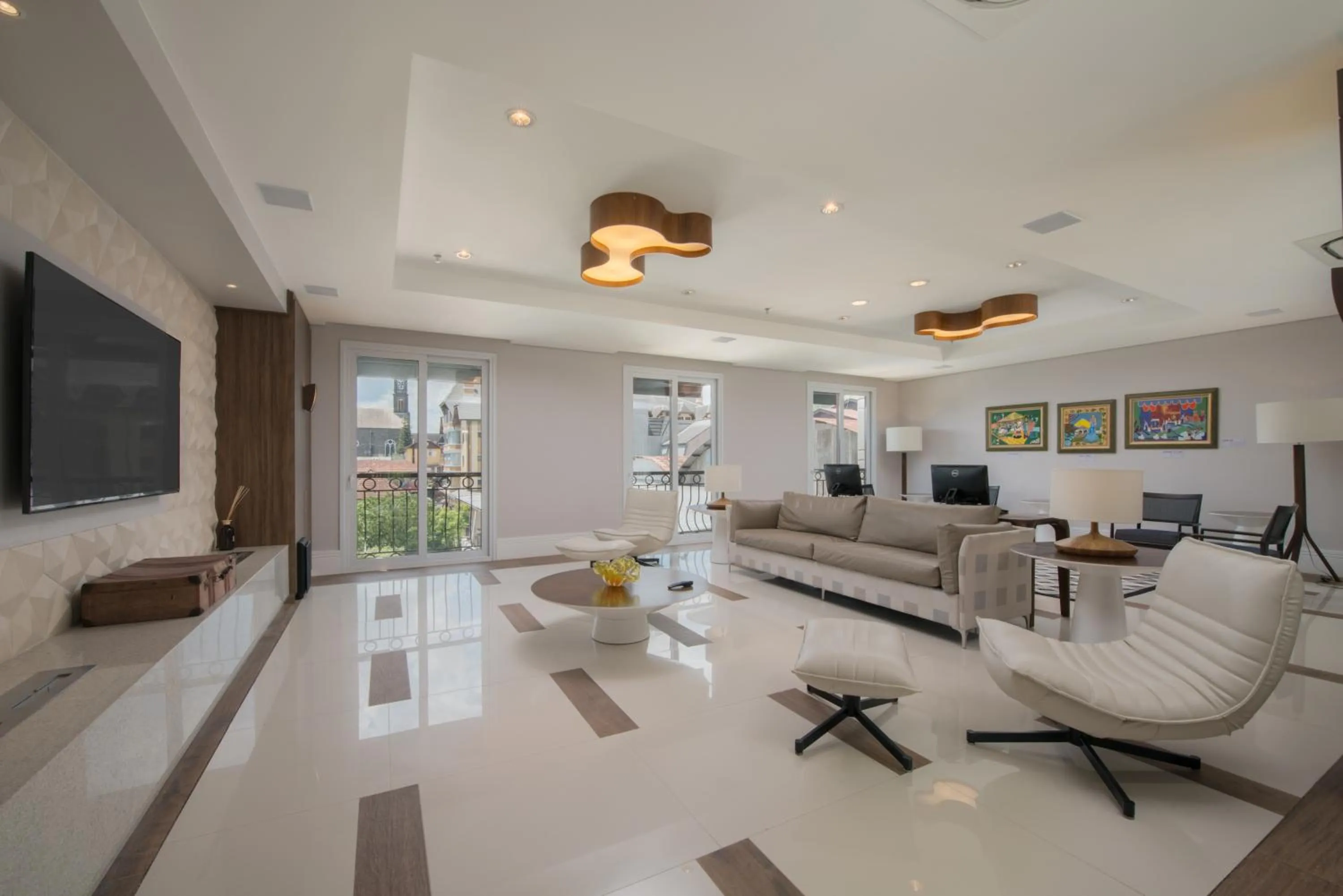 Communal lounge/ TV room in Prodigy Gramado by Wish