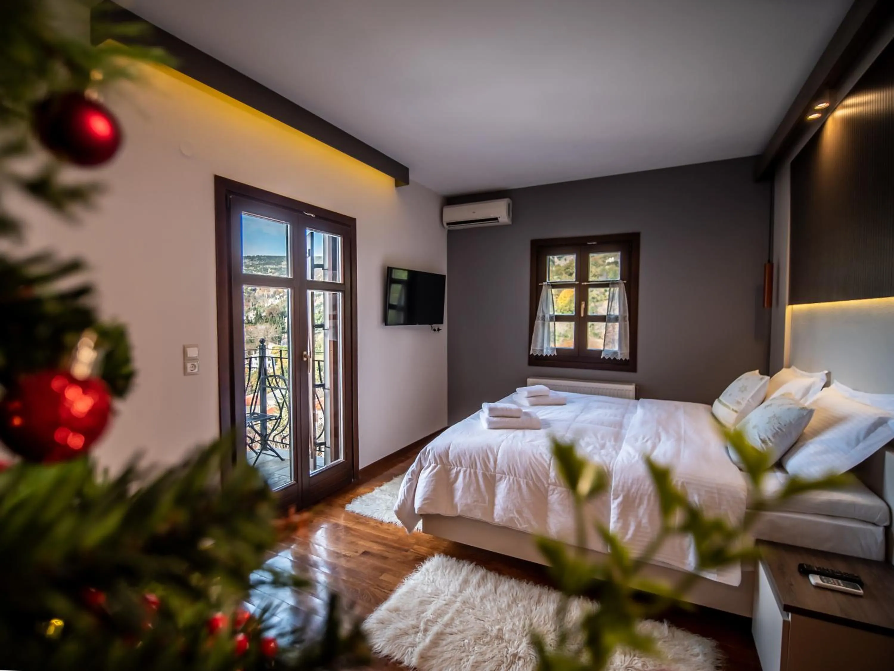 Bed in Erofili Hotel & Suites