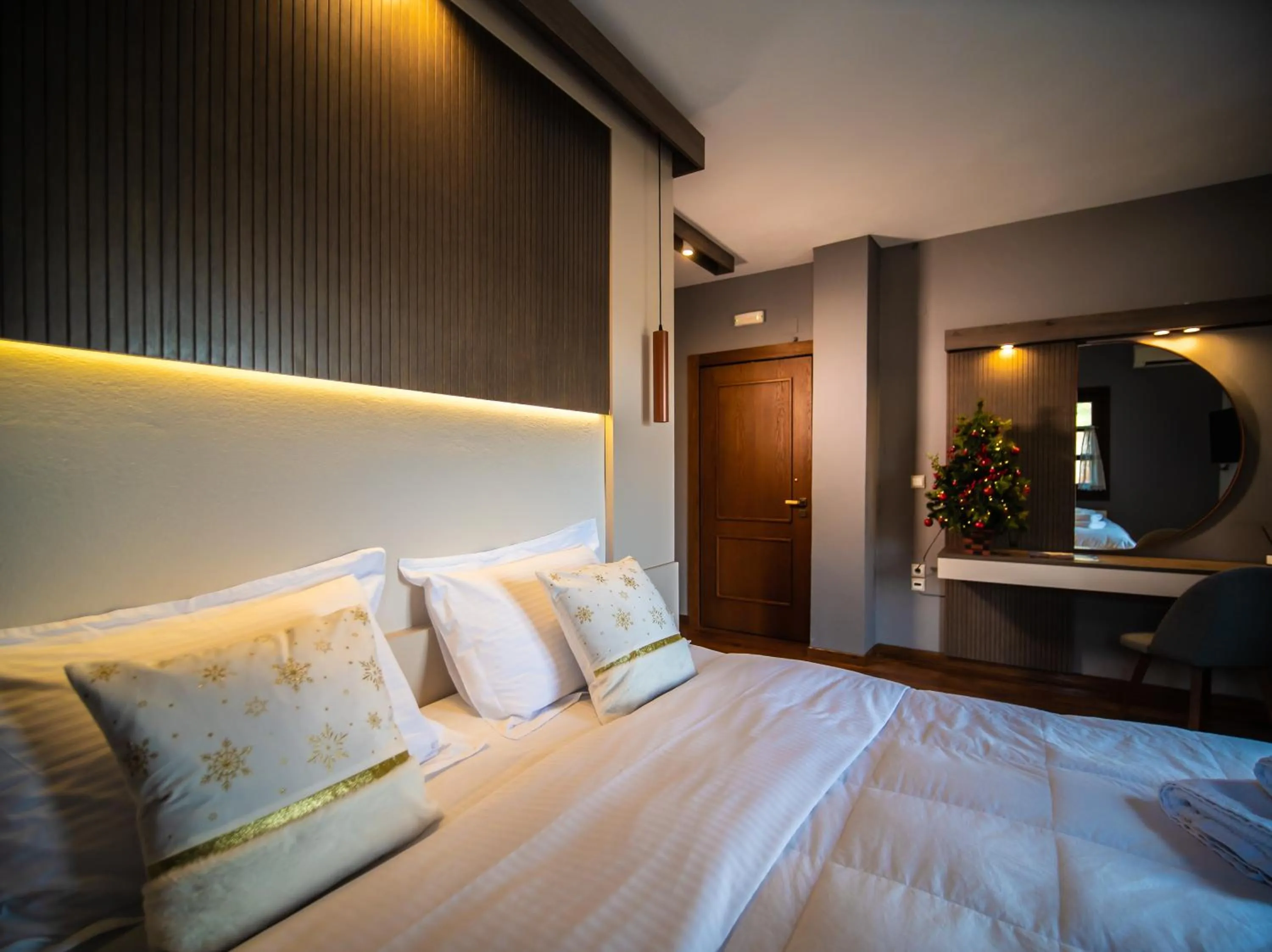 Bed in Erofili Hotel & Suites