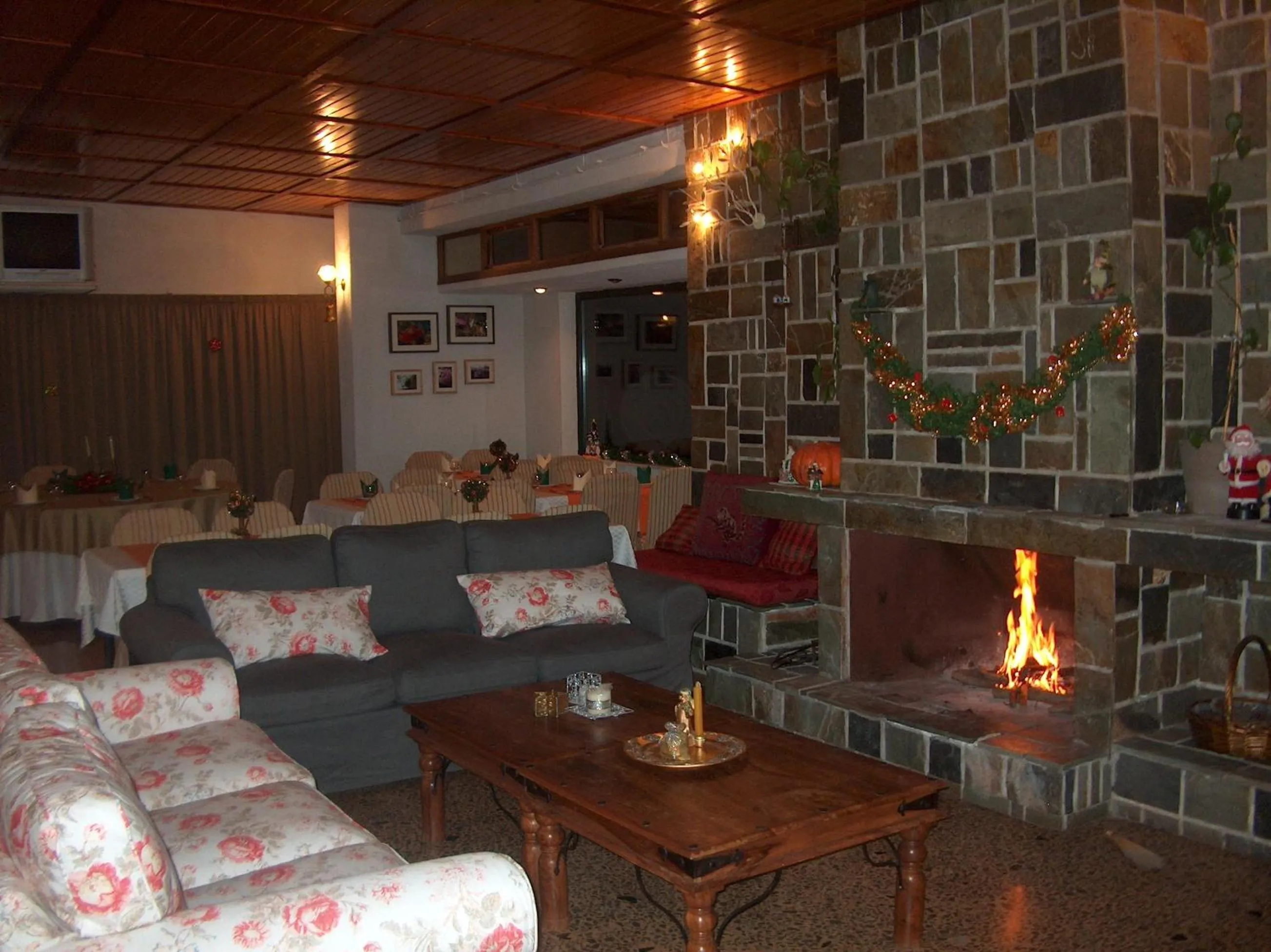 Communal lounge/ TV room in Chrissa Camping Rooms & Bungalows