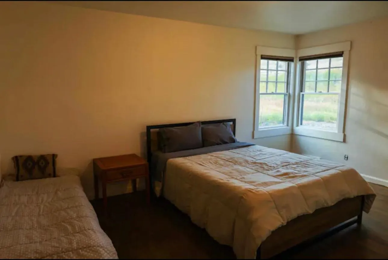 Bed in Sportsman Lodge Melrose MT