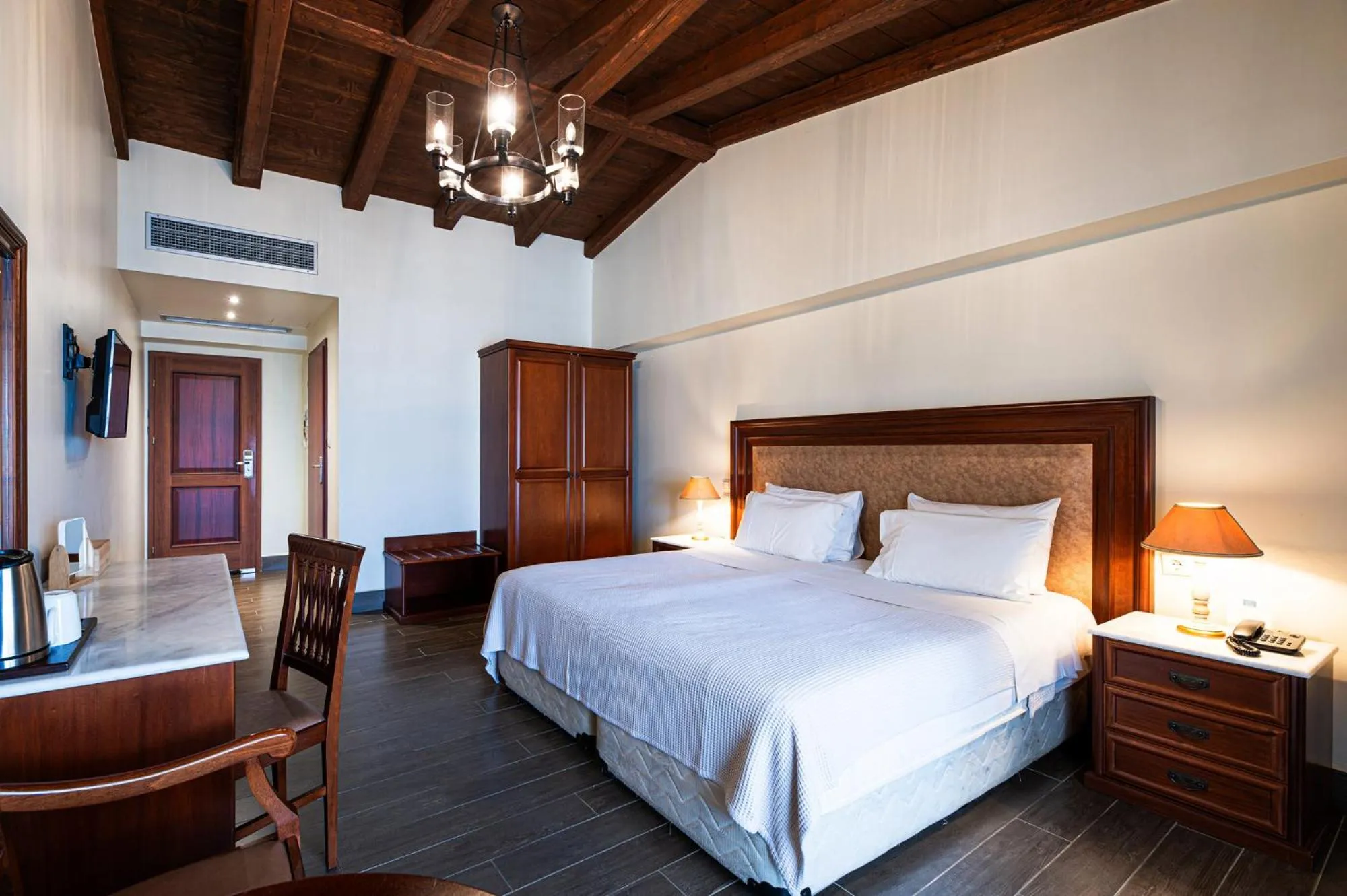 Bed in Itilo Traditional Hotel