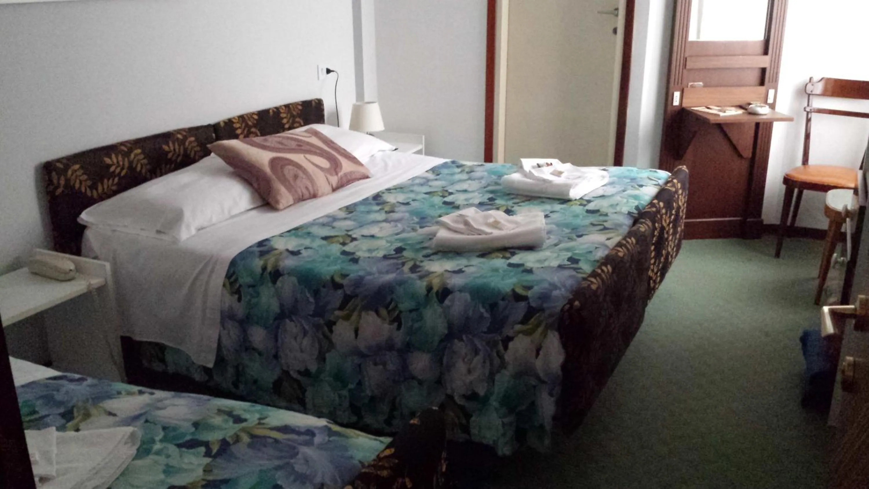 Bed in Hotel Mirabeau