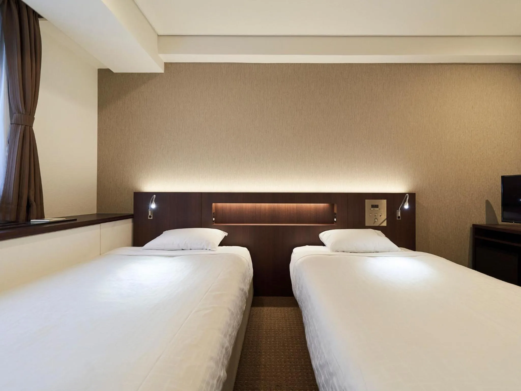 Bed in Princess Garden Hotel