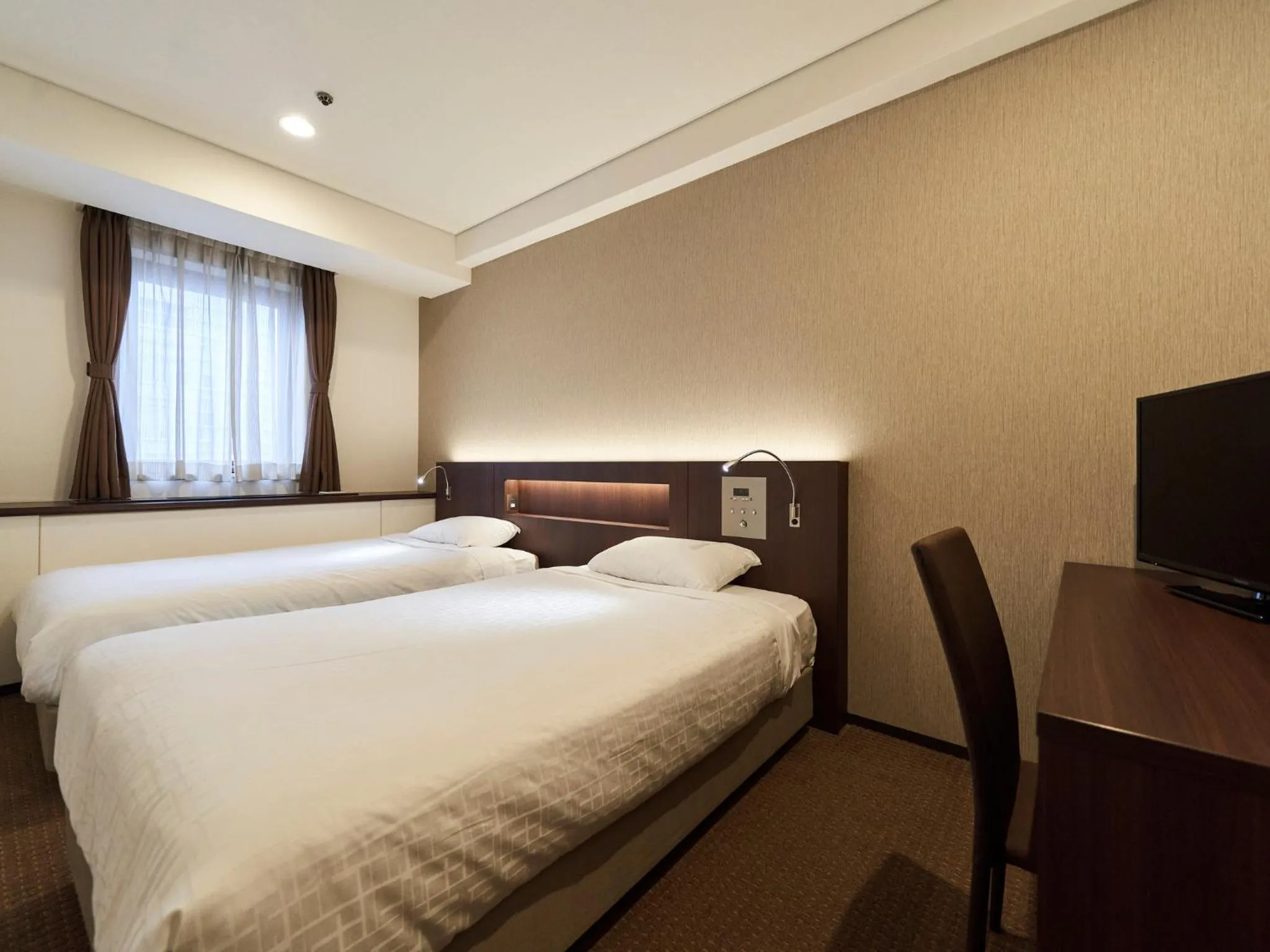 Bed in Princess Garden Hotel